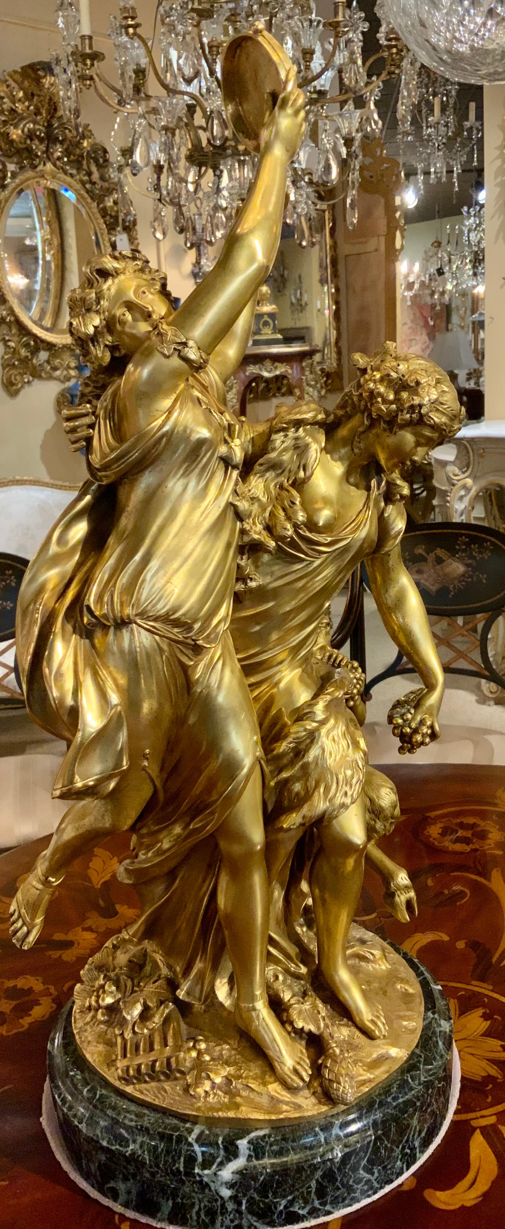 Fine gilt bronze statue “Bacchanale” after Claude Michel known as
clodion. He was a French sculptor born in 1738. It depicts two dancing
Bacchantes with a tambourine with a child satyr. Signed in the bronze
Clodion 1738 at the base on the back.
