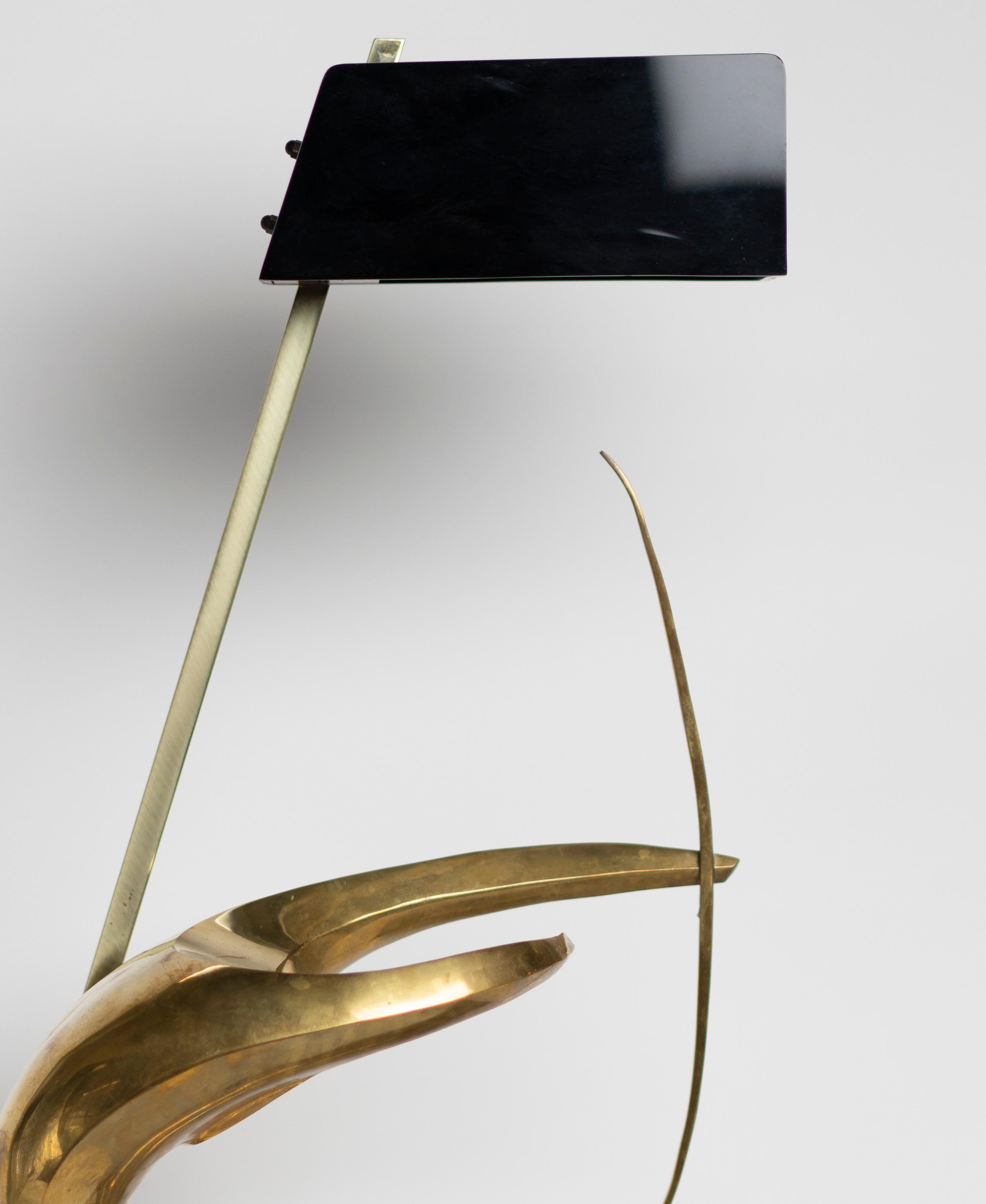 Gilt bronze table lamp representing an archer by Maxime Delo for Pragos
Signed engraved: 