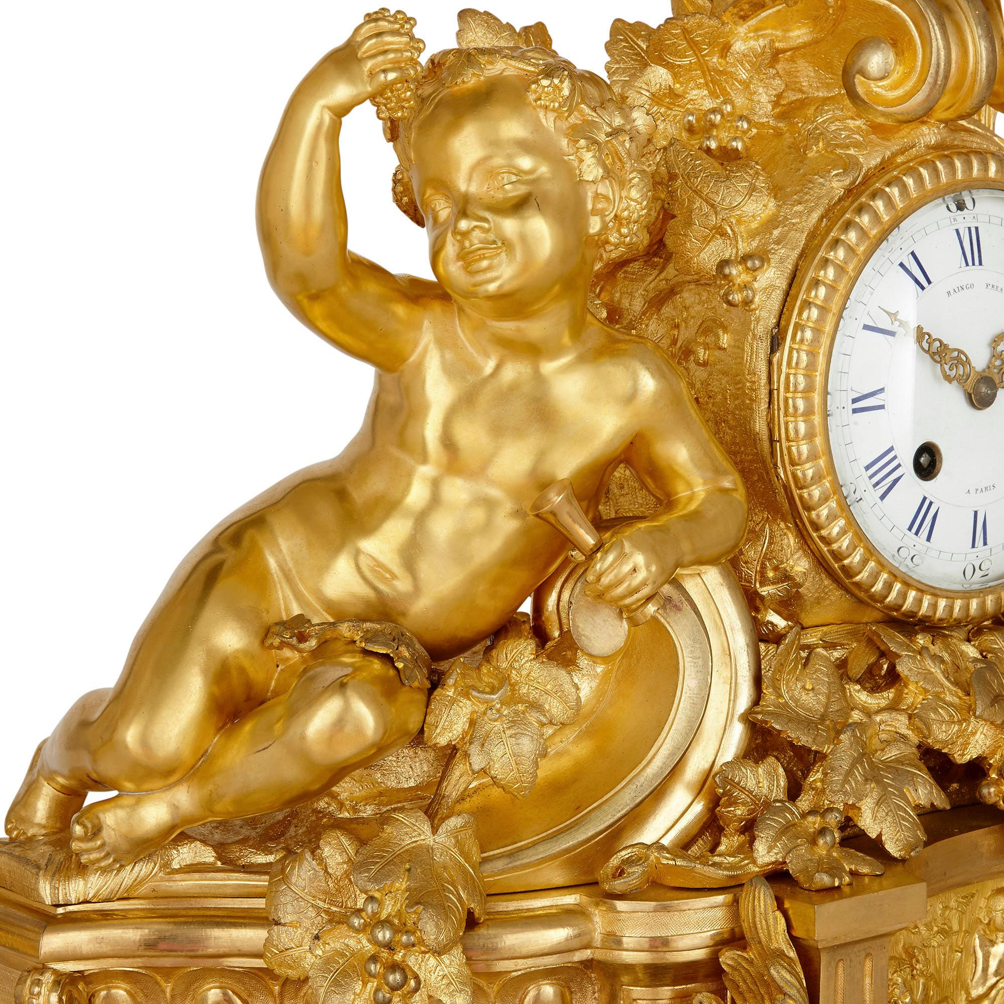 Rococo Ensemble d'horloges trois pièces en bronze doré de Raingo Frres et Henri Picard en vente