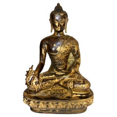 Gilt Bronze Tibetan Buddha in Embossed Robe