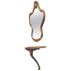 Gilt Console Mirror with Shelf  This is a very lovely piece