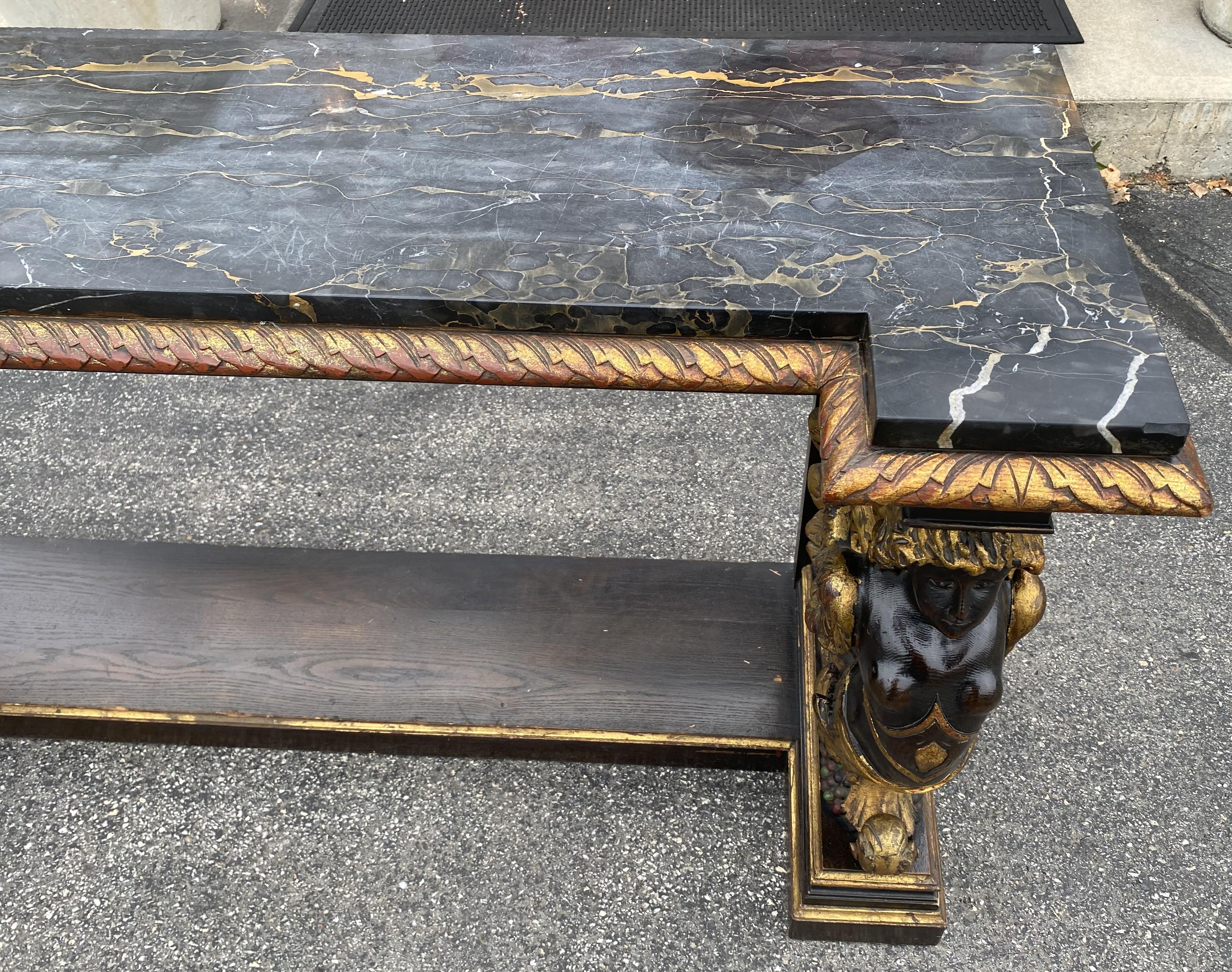 Hand-Carved Gilt & Ebonized Marble Top Pier Table with Winged Caryatid Supports For Sale