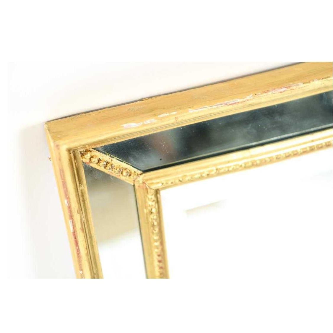Gilt faceted mirror with bead detail. Measure: 19