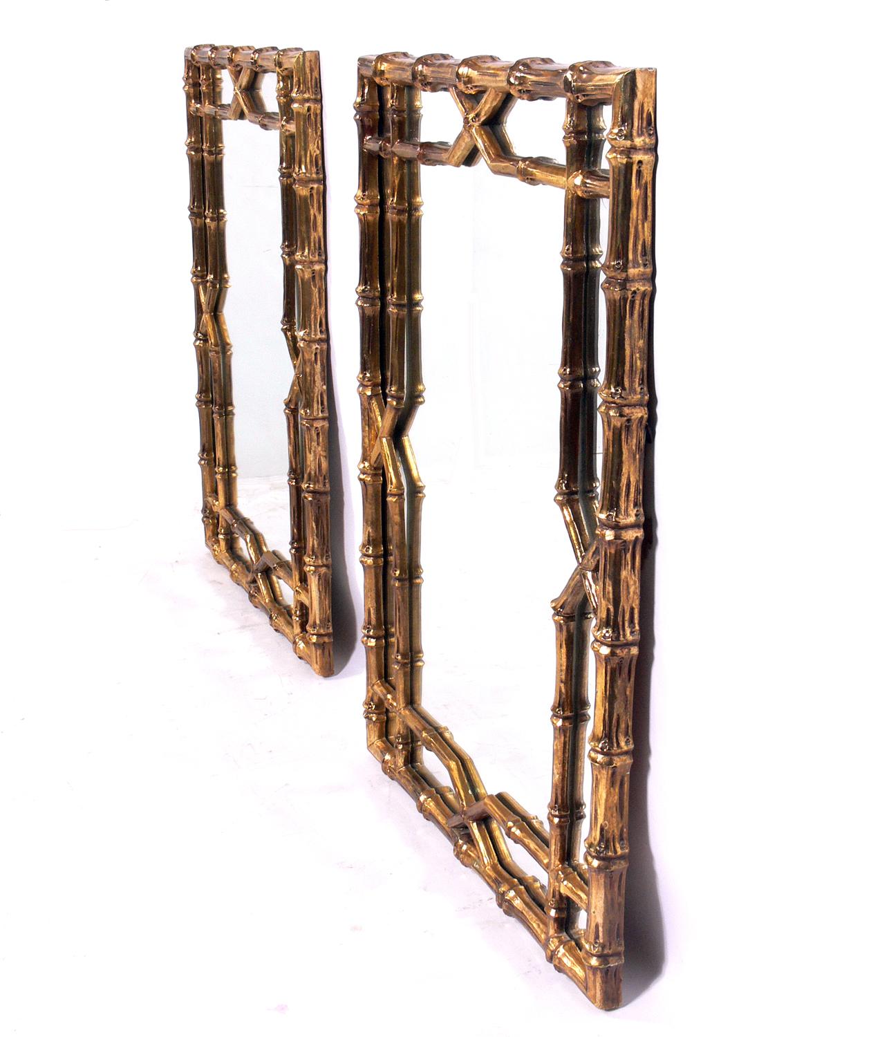 Gilt faux bamboo mirrors, American, circa 1950s. They retain their warm original patina. They are priced at $4800 for the pair or $2600 for each mirror.