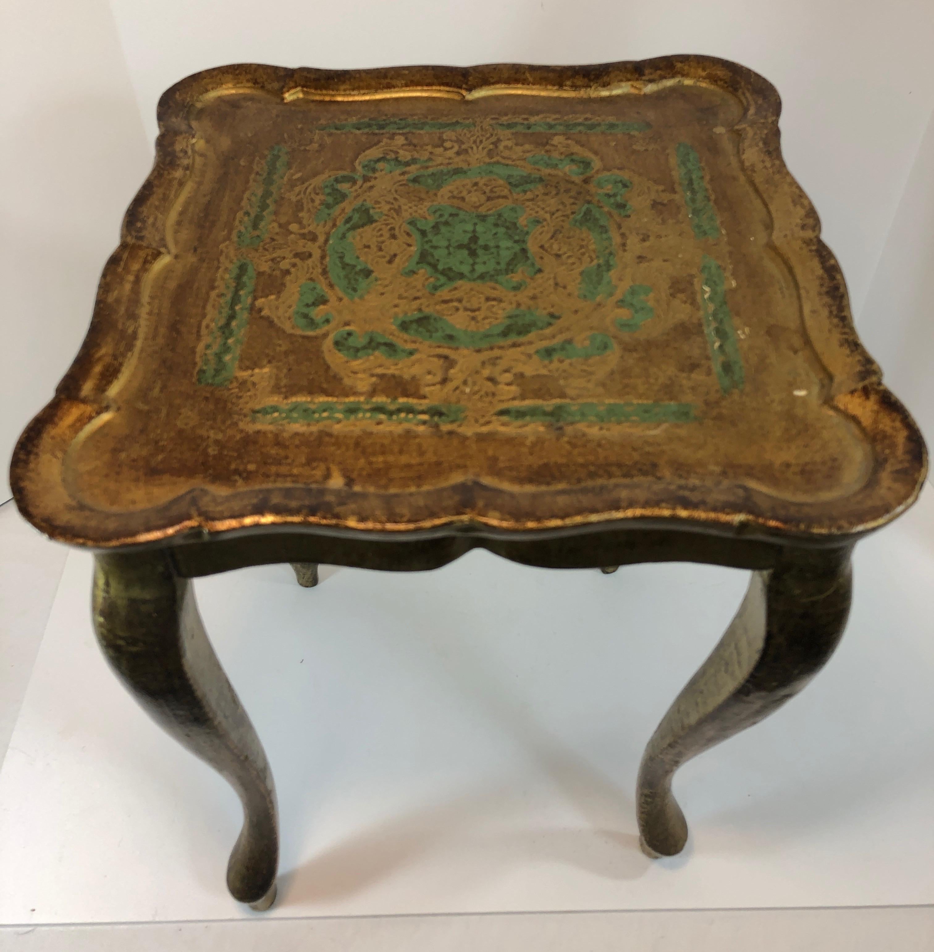 Florentine side table with gold and green gilt finish. Good overall condition, minor wear due to age and use.