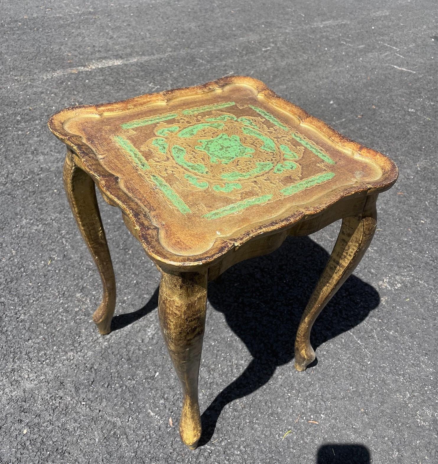 Florentine side table with gold and green gilt finish. Good overall condition, minor wear due to age and use.