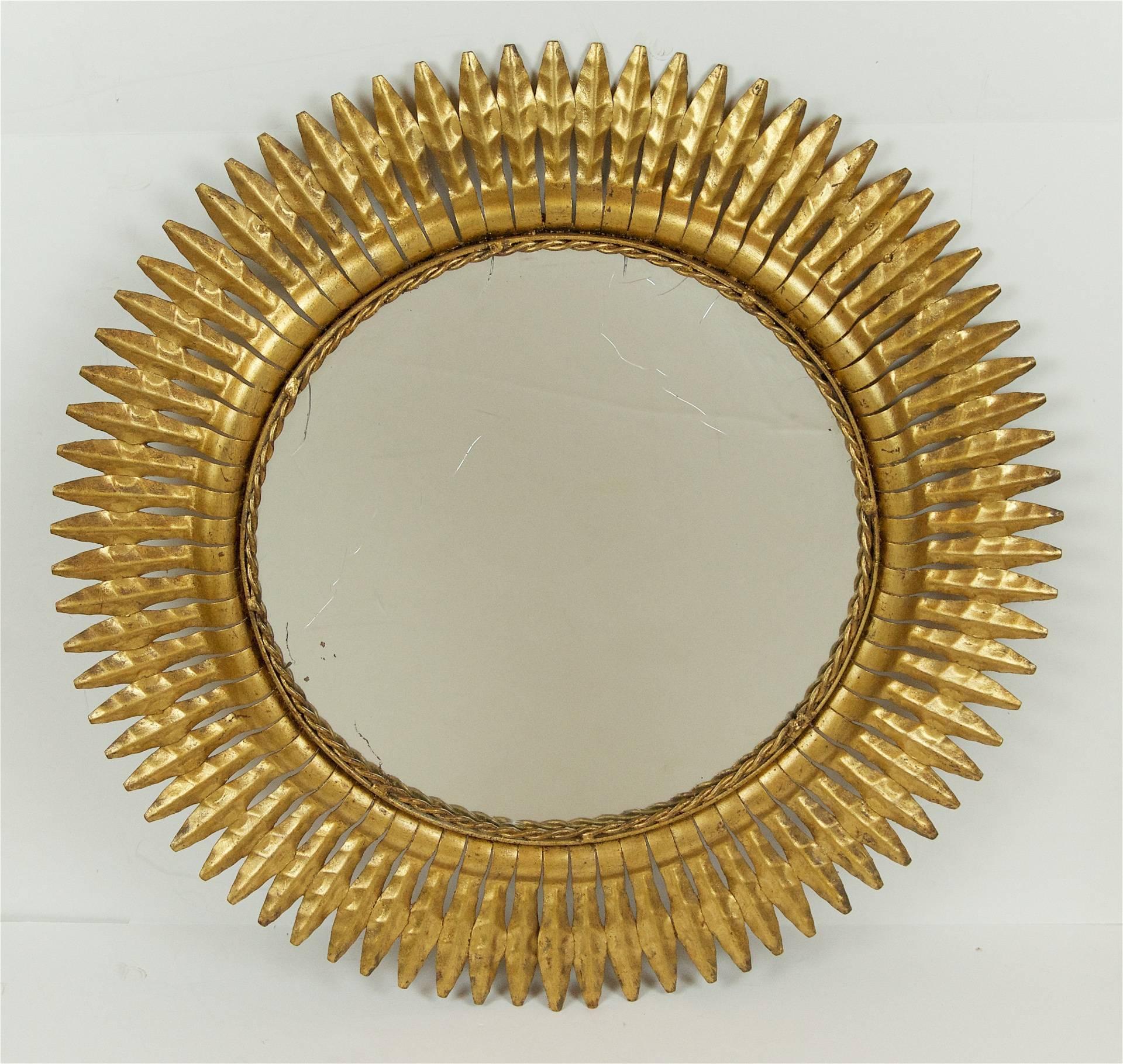 Midcentury German floral gilt mirror of excellent size and finish.