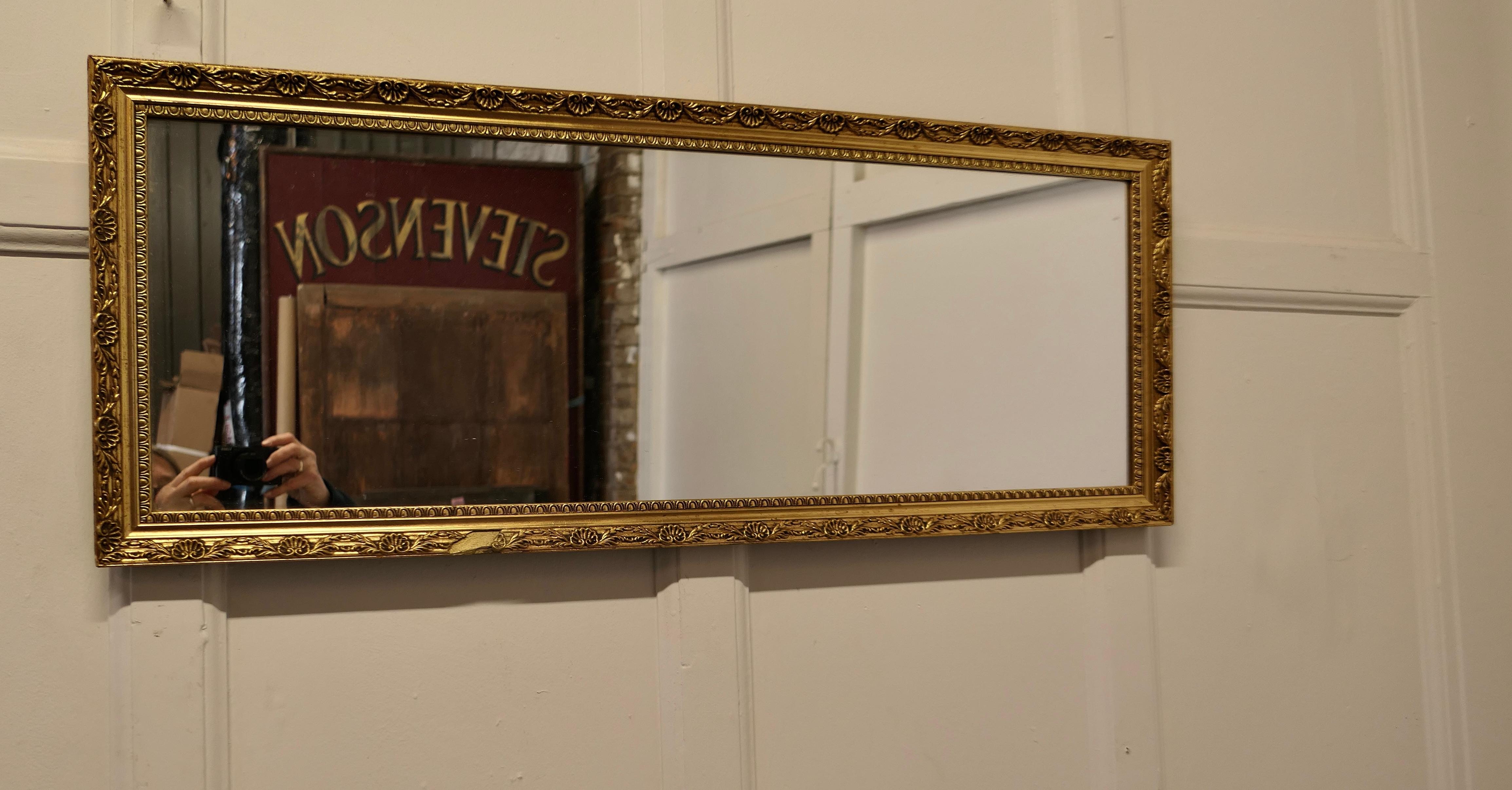 Early 20th Century Gilt Frame Long Wall Mirror This is a Charming and Elegant Piece For Sale