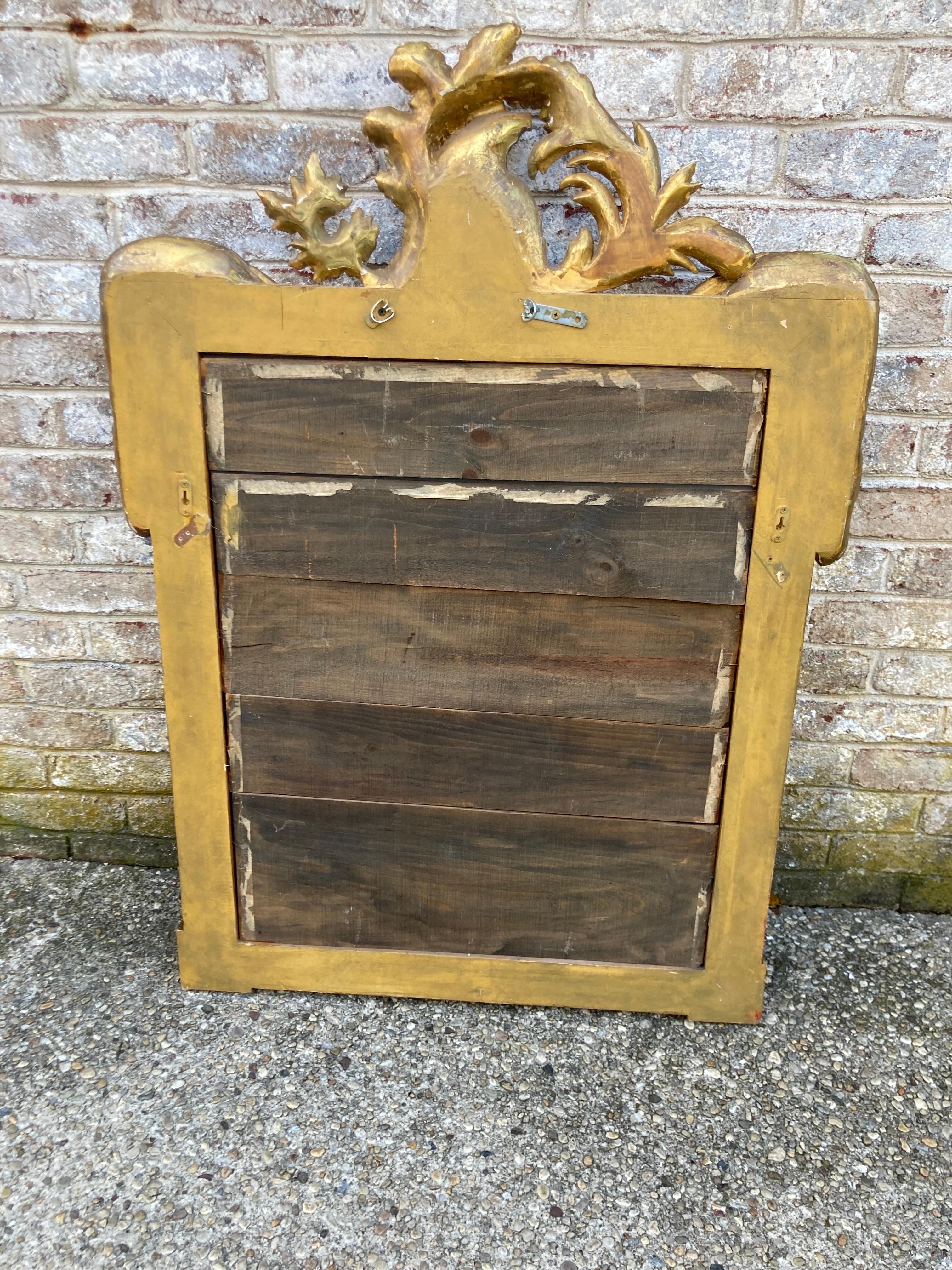 Gilt Framed French Carved Mirror with Helmet For Sale 9
