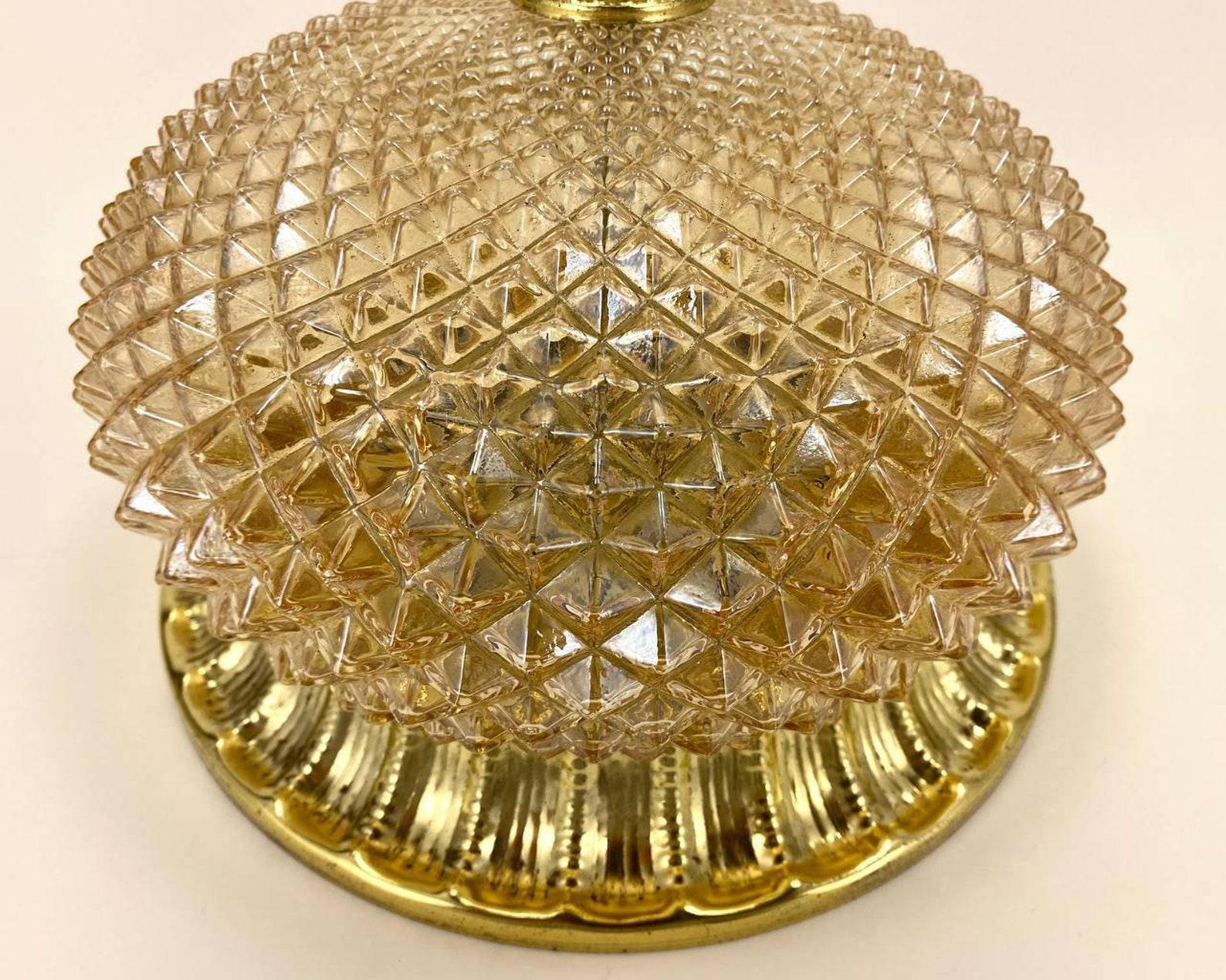 Luxurious ceiling lamp. Gold-plated glass shade and matching gilded brass frame. 

 The ceiling lamp is a real example of high-quality, beautiful and durable lighting. With its help, you can both provide full-fledged overhead lighting, and create