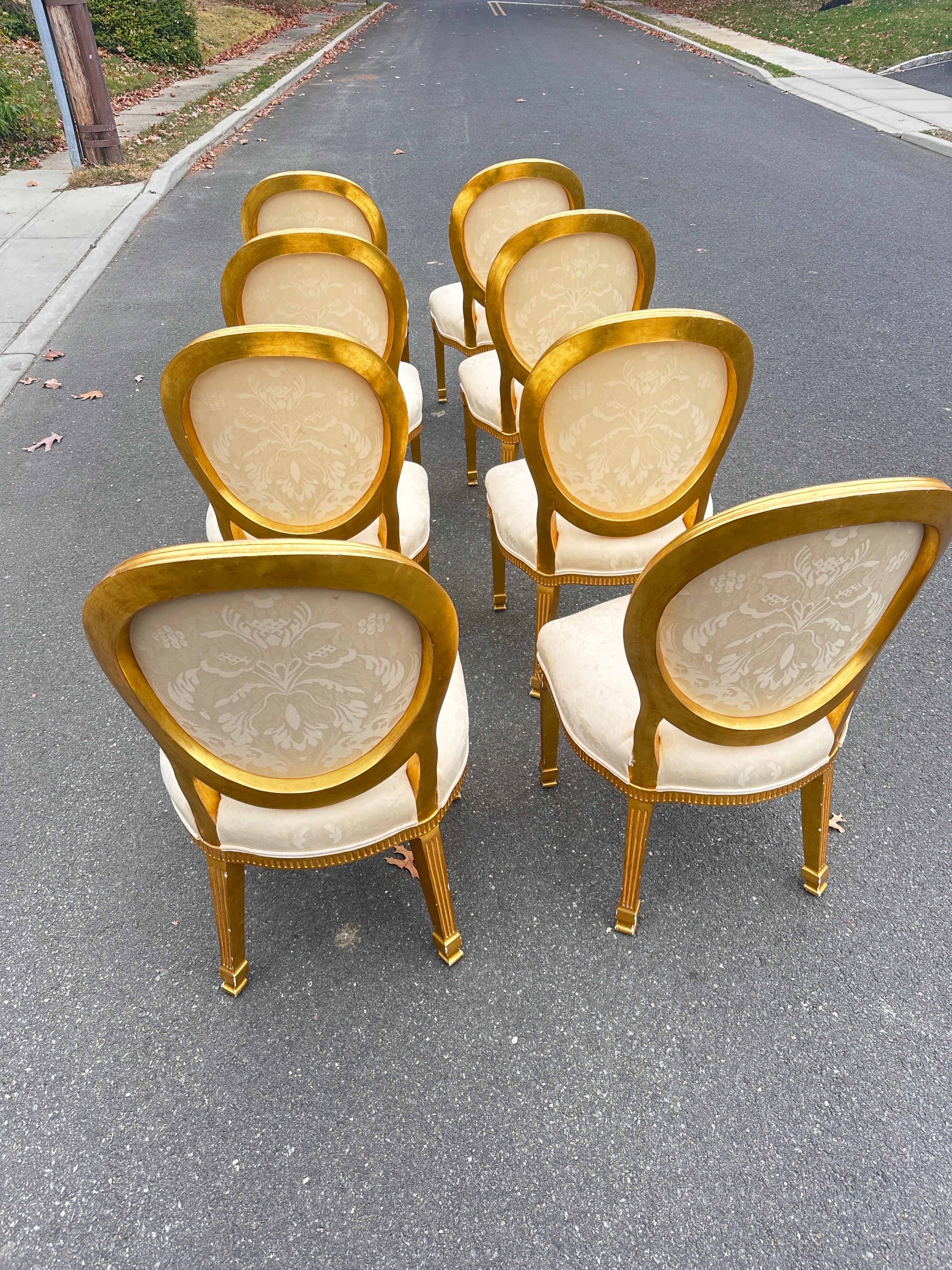Highly reflective gilt gold finish over wood, sturdy high quality American craftsmanship, classic provincial styling and attention to every last detail, but in a wider format and very comfortable contemporary construction. 

From a private estate,
