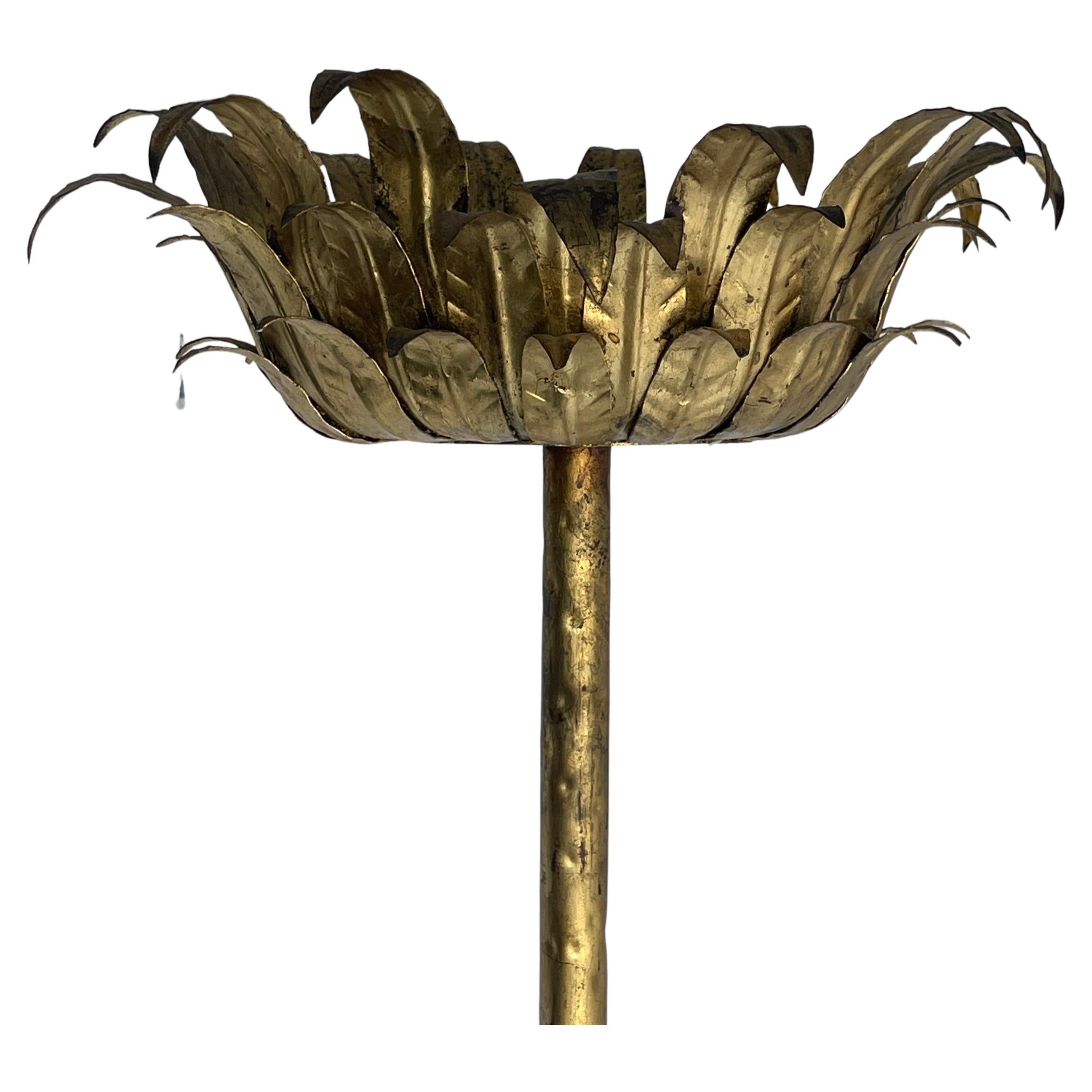 Tall Spanish Gilt Gold Textured Torchiere Tole Plant Stand

A beautiful, tall antiqued gold tole standing floral planter hand-crafted in Spain. The very sturdy iron tripod arch base features a hammered and textured finish. This piece would be a