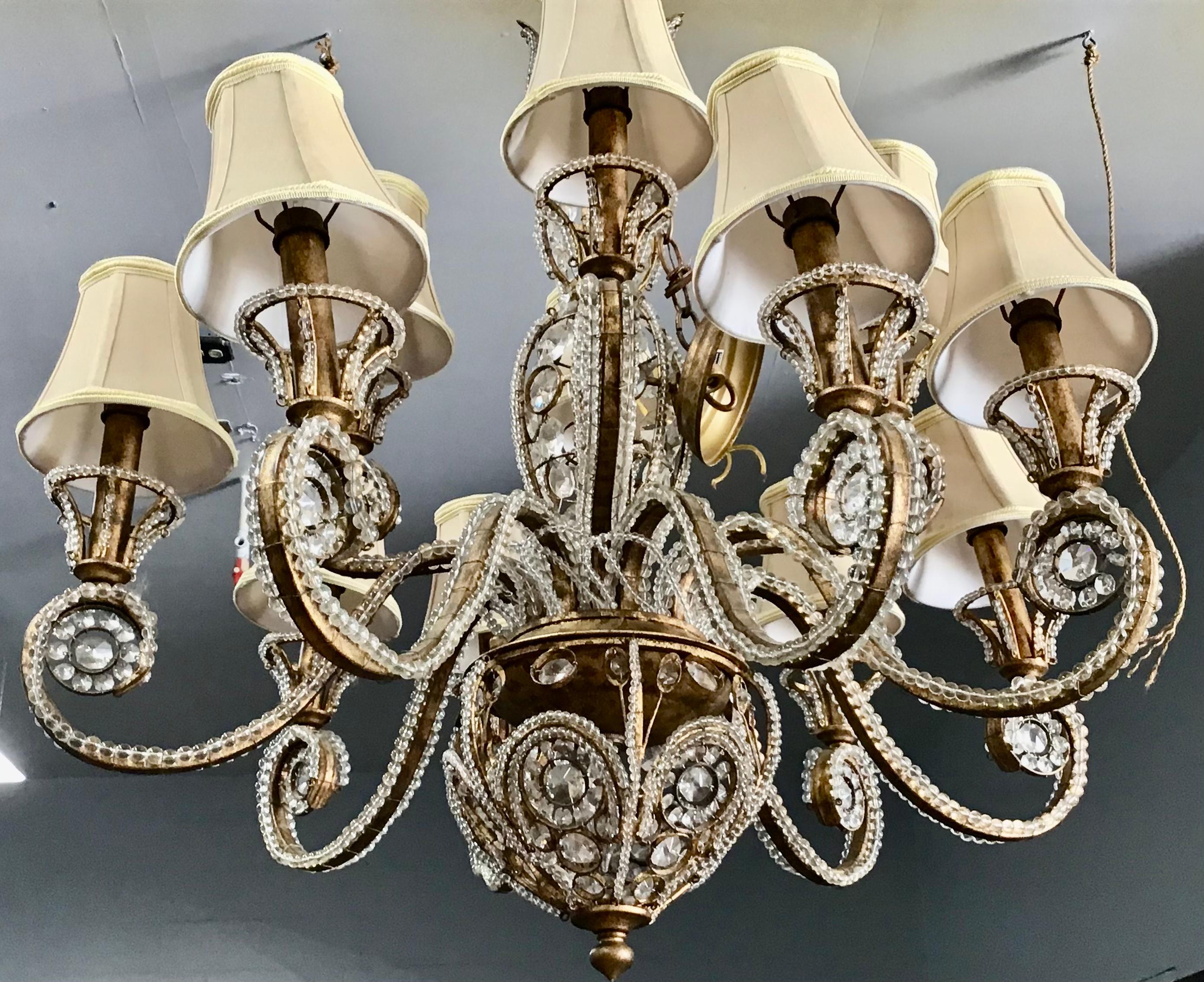 Gilt Iron and Crystal Beaded Chandelier In Good Condition For Sale In Bradenton, FL