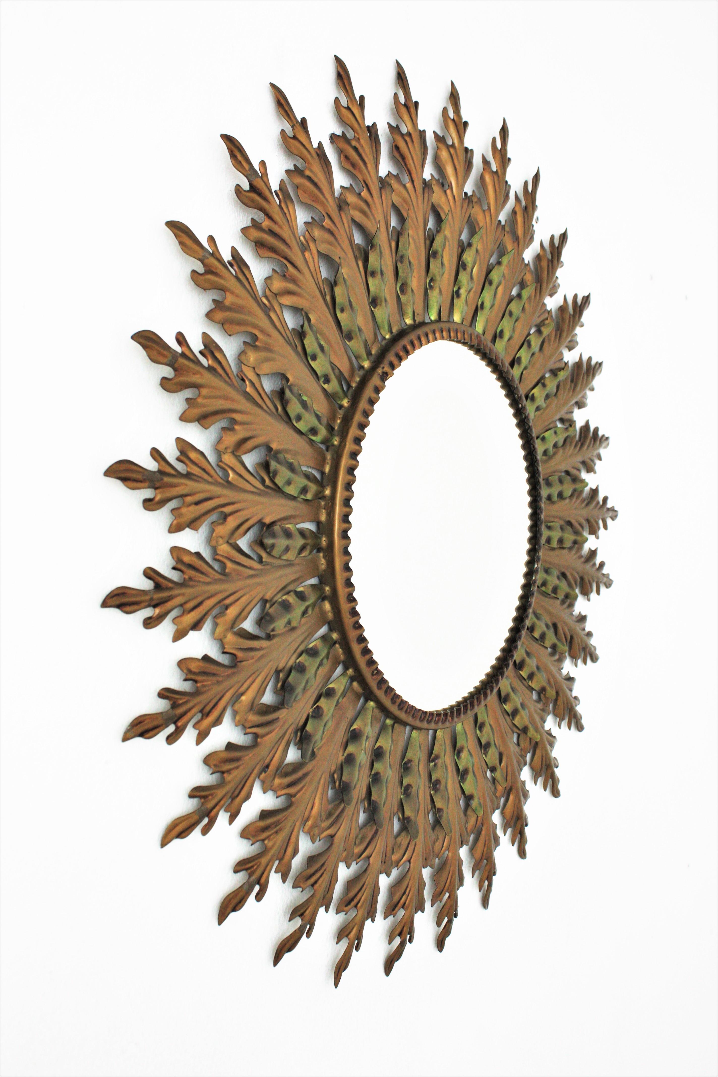 Spanish Sunburst Mirror in Gilt Metal with Green Accents,  1960s For Sale