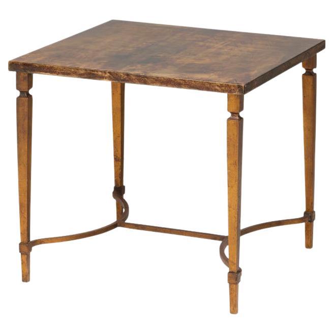 Table d'appoint en fer doré et peau de chèvre laquée par Maison Ramsay en vente