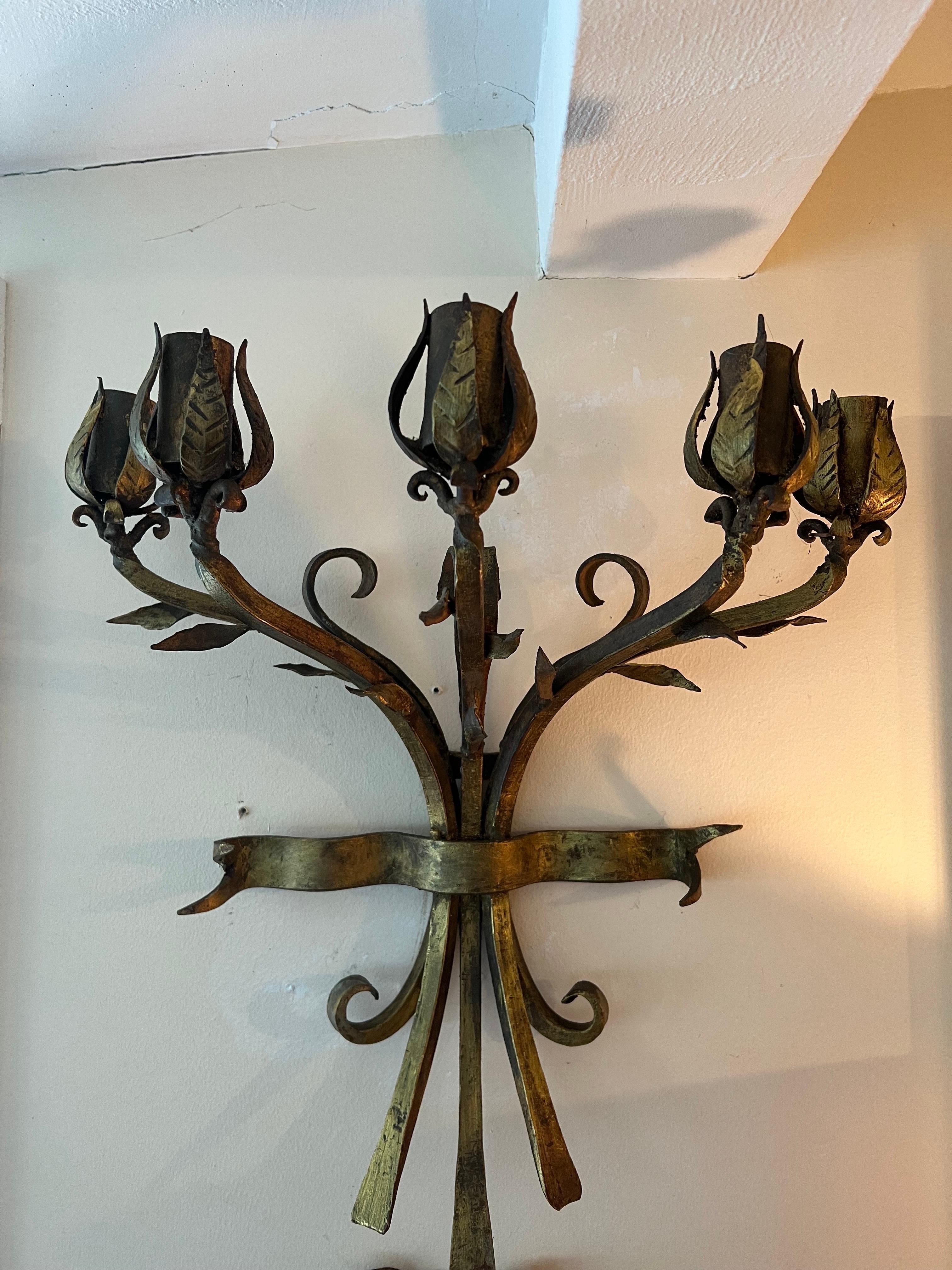 Gilt Iron Bronze Floral Wall Candleholder. Very heavy solid consruction. Gorgeous piece to add romance to a room. Also could be electrified. 5 total candle holders.