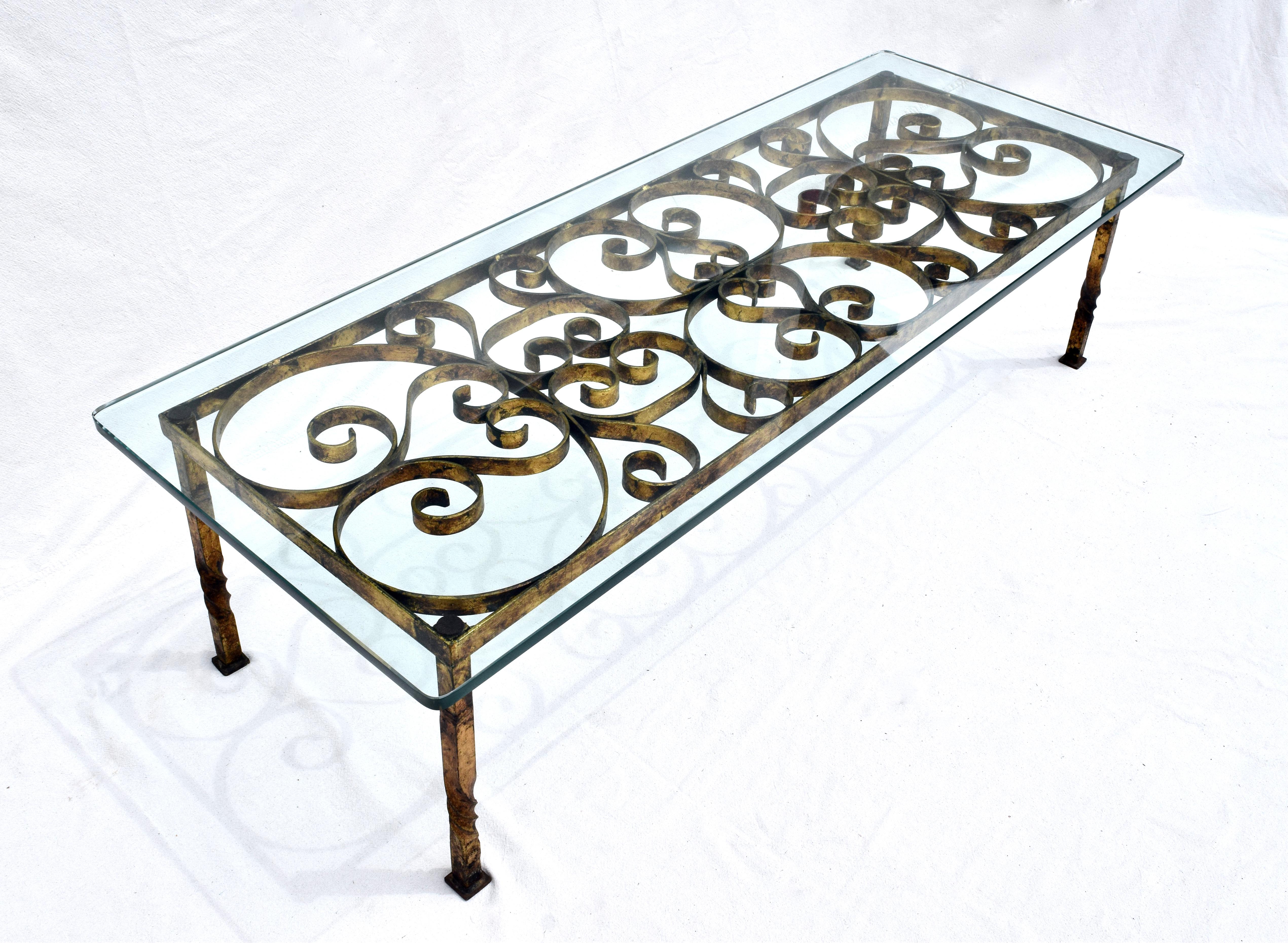 Hand forged iron parcel-gilt cocktail table with original 3/4