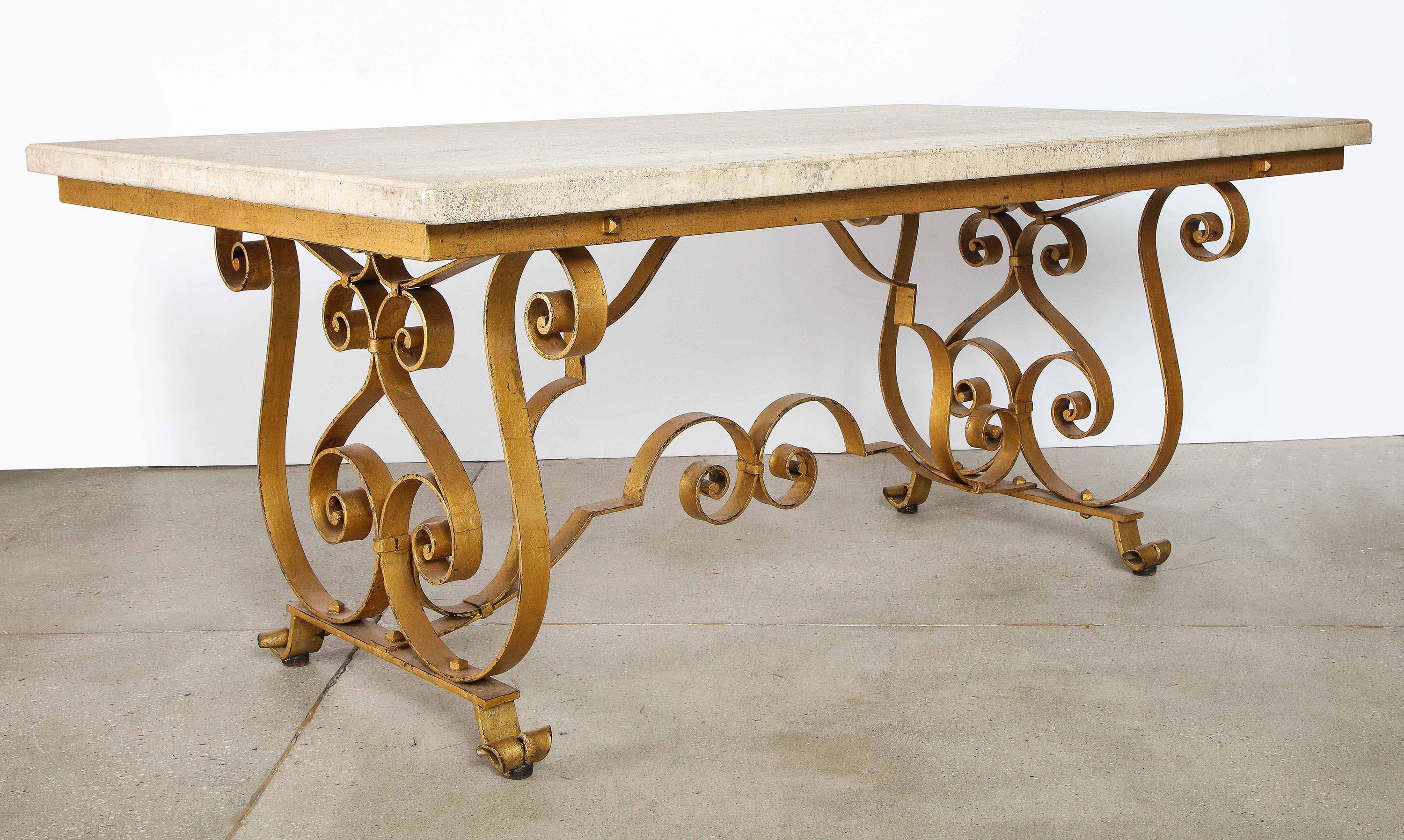 French gilt iron table, attributed to Gilbert Poillerat

The travertine marble top over a gilt iron double scroll base and scroll stretcher.