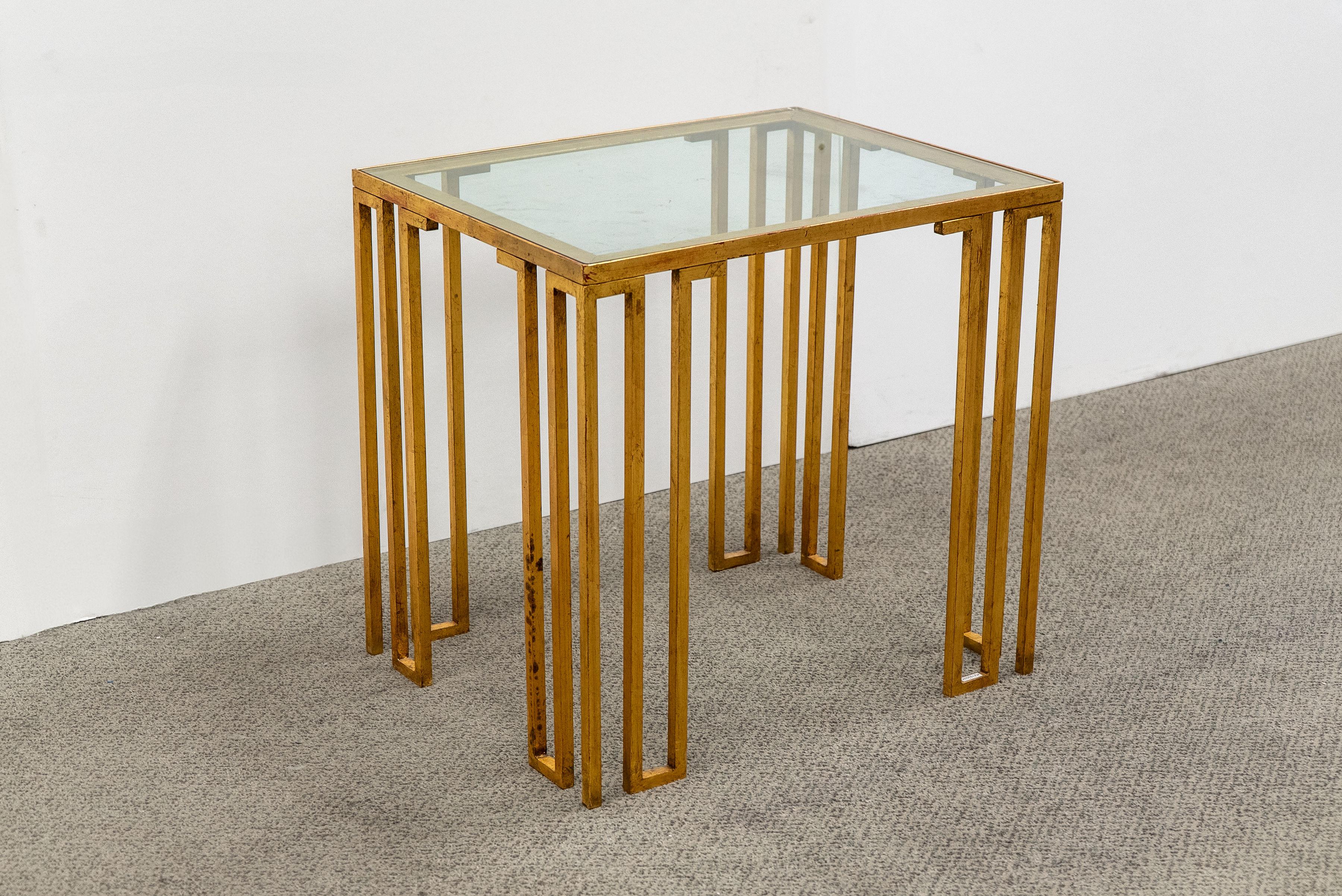 Vintage French gilt iron end table with inset glass top. This table is in the style of Jean Royere's 