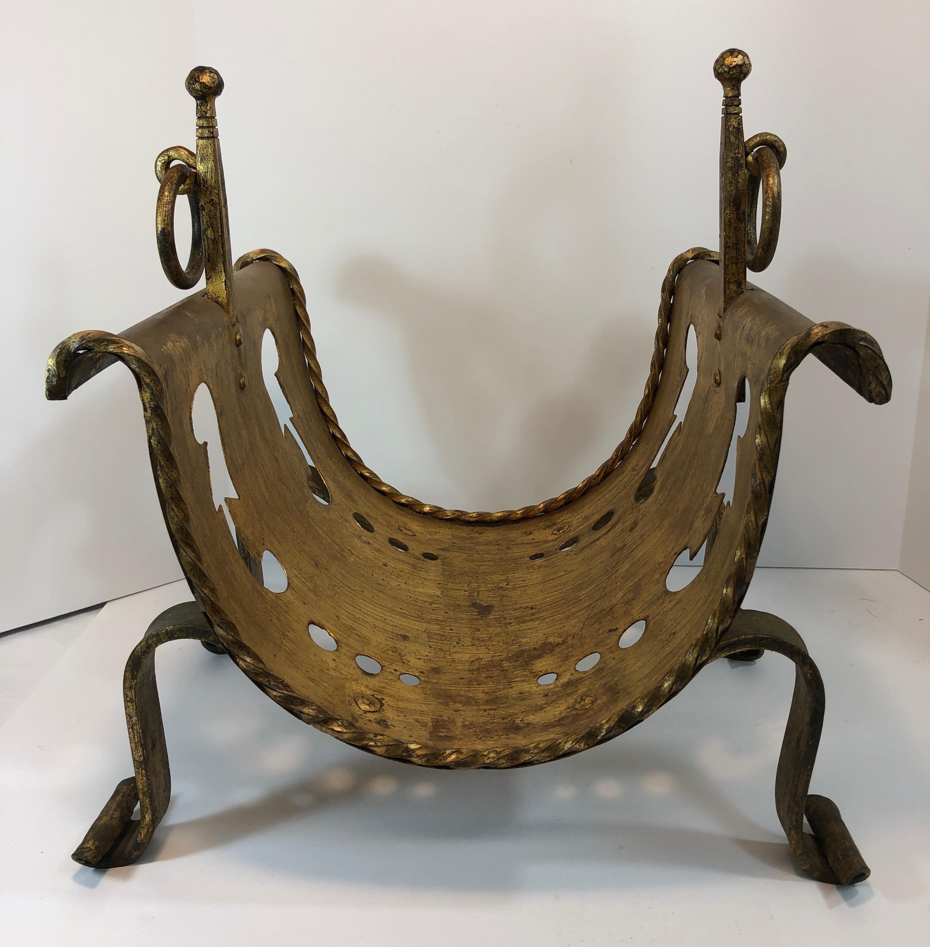 Gilt iron log holder or magazine rack. Very good overall condition for age, slight dark areas at bottom where logs or magazines would sit.