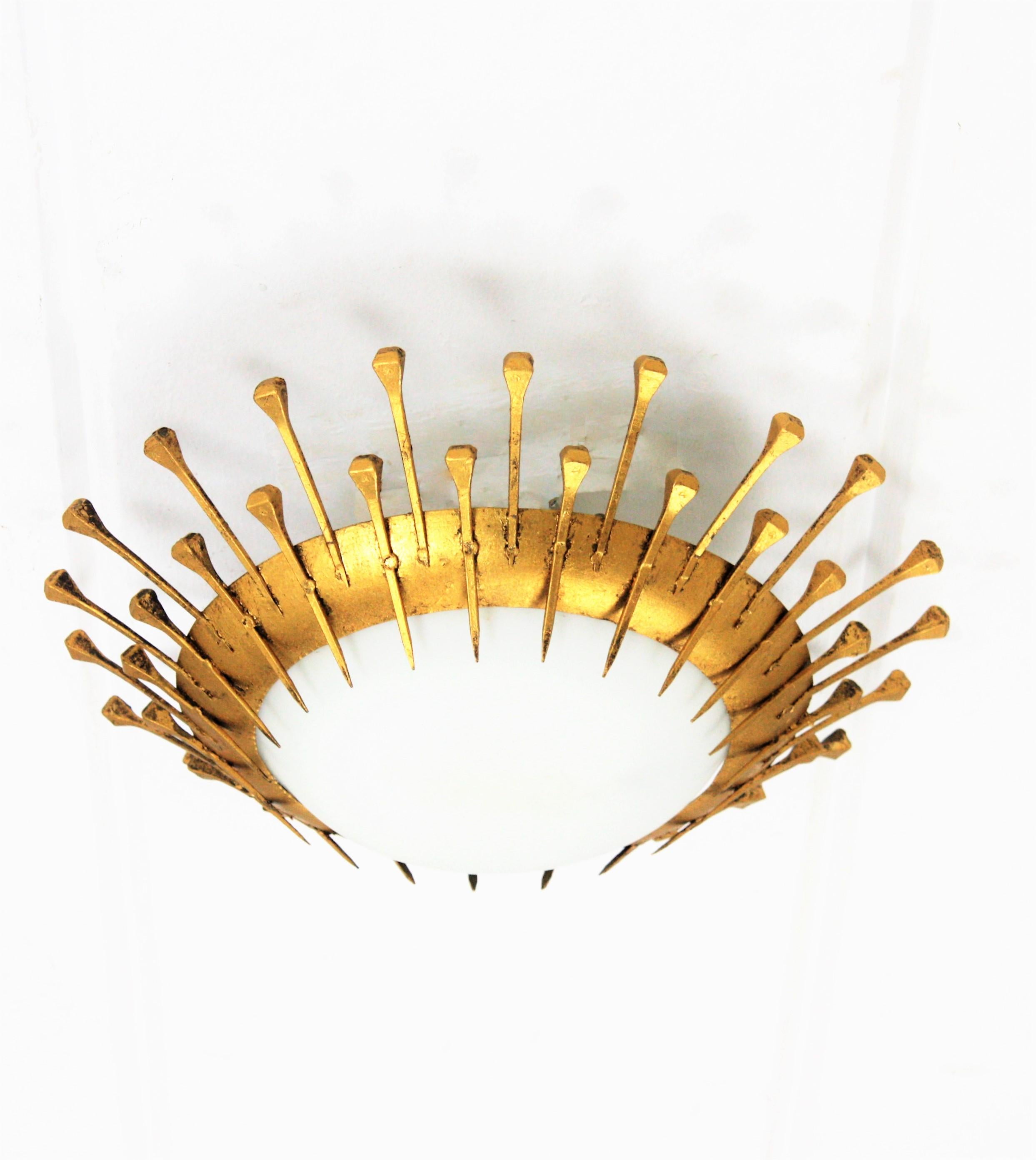 French Sunburst Light Fixture with Nail Design, Gilt Iron, Milk Glass In Good Condition In Barcelona, ES