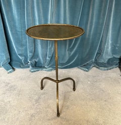 Gilt Iron Side Table On An Arched Tripod Base