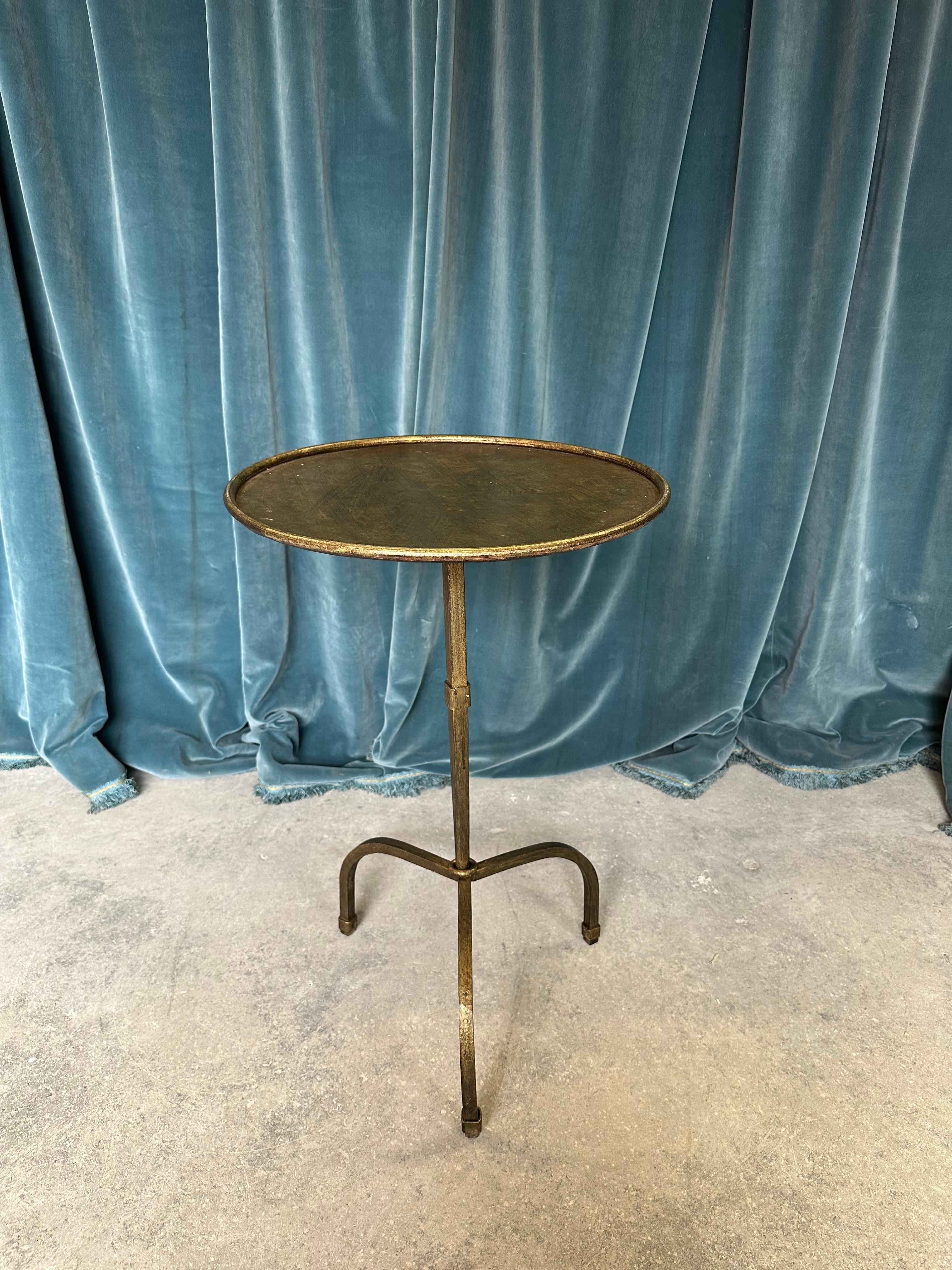 Contemporary Gilt Iron Side Table On An Arched Tripod Base For Sale