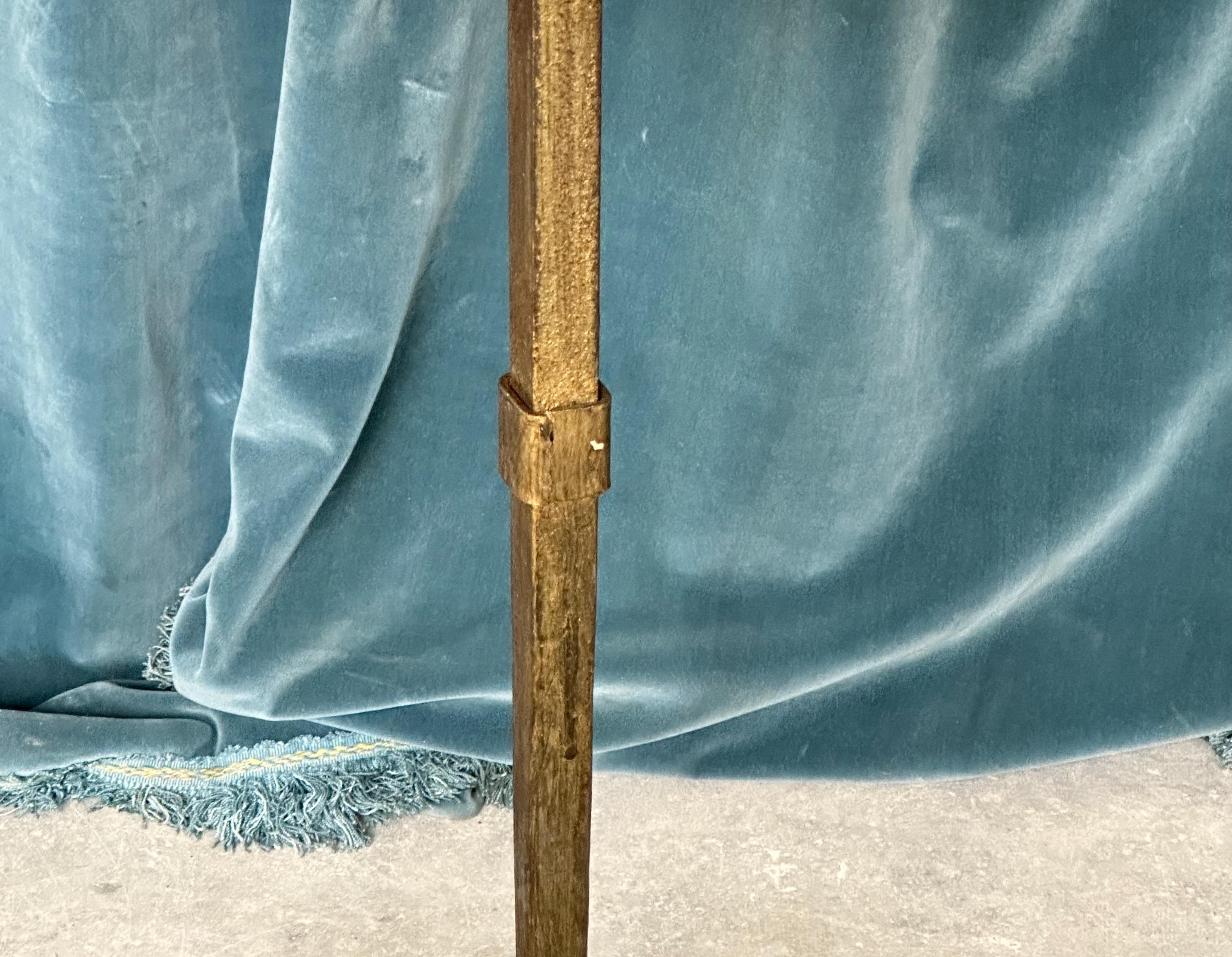 Contemporary Gilt Iron Side Table On An Arched Tripod Base For Sale