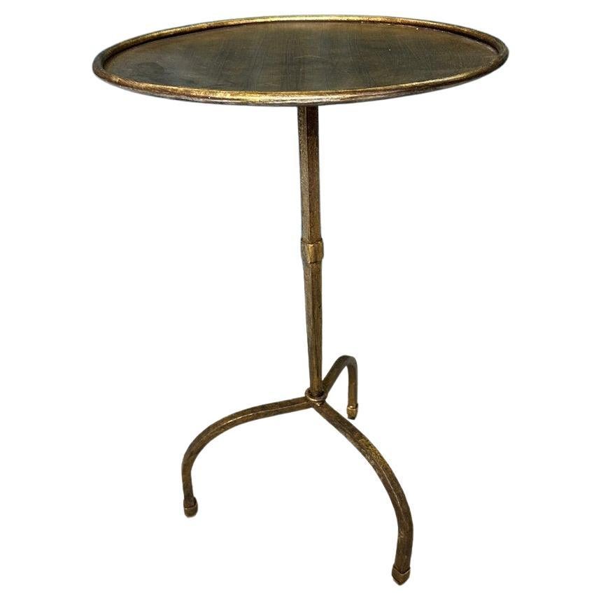 Gilt Iron Side Table On An Arched Tripod Base For Sale