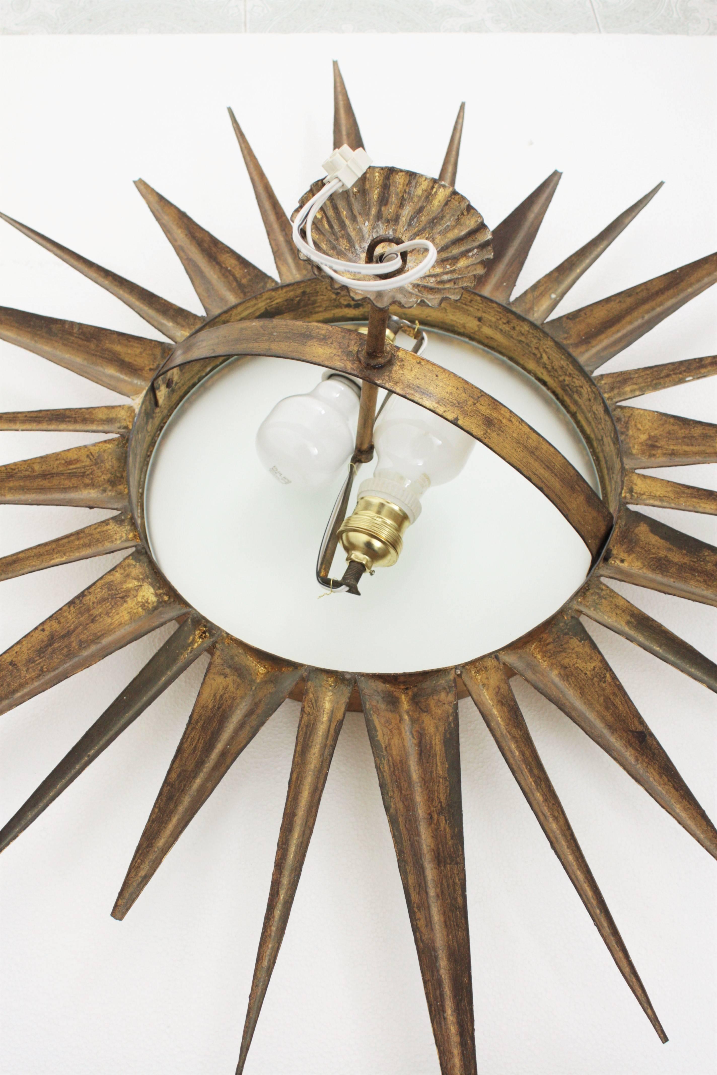 Mid-Century Modern Gilt Iron Sunburst Ceiling Light Fixture and Sunburst Mirror 3