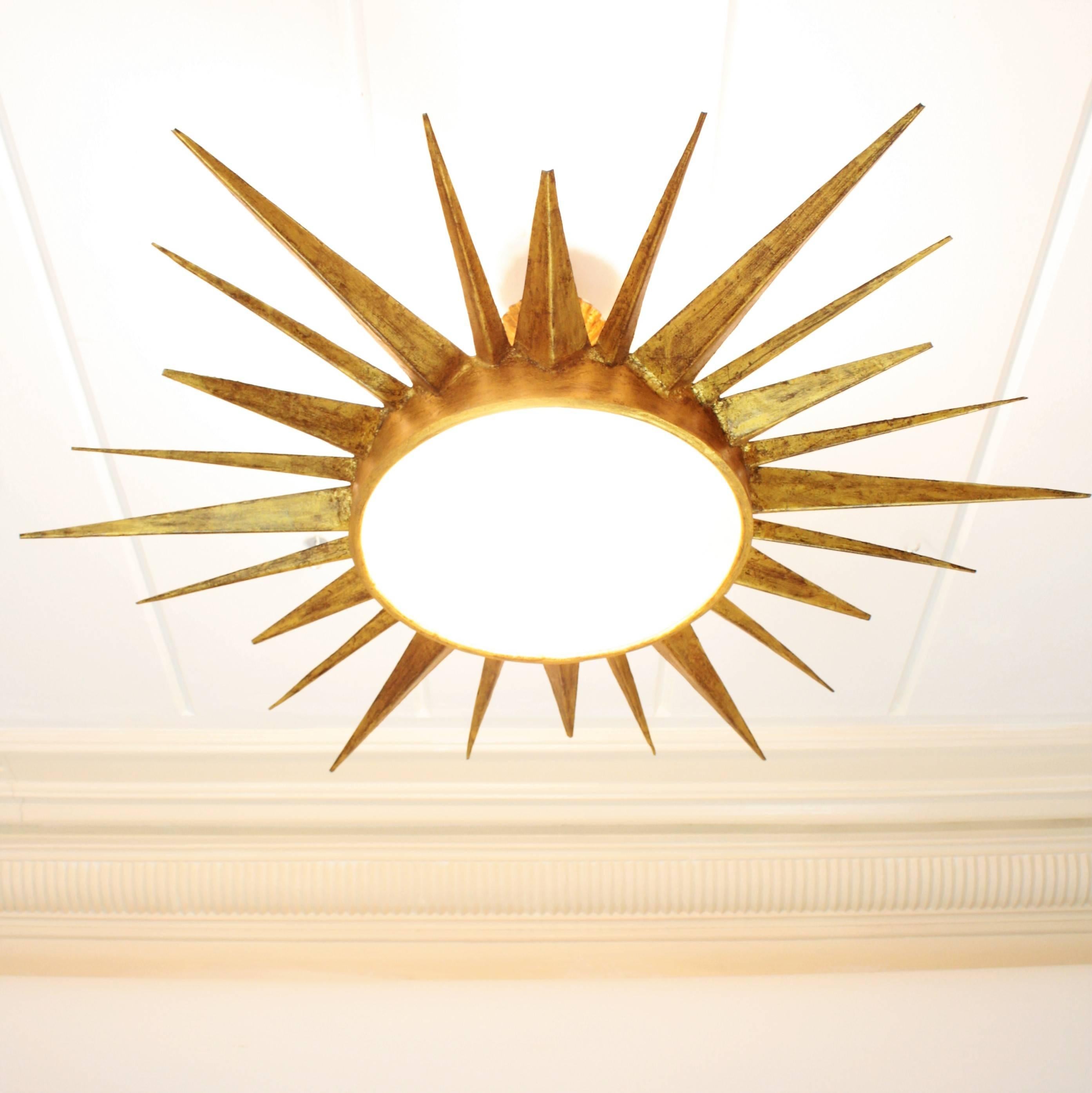 Mid-Century Modern Gilt Iron Sunburst Ceiling Light Fixture and Sunburst Mirror 1