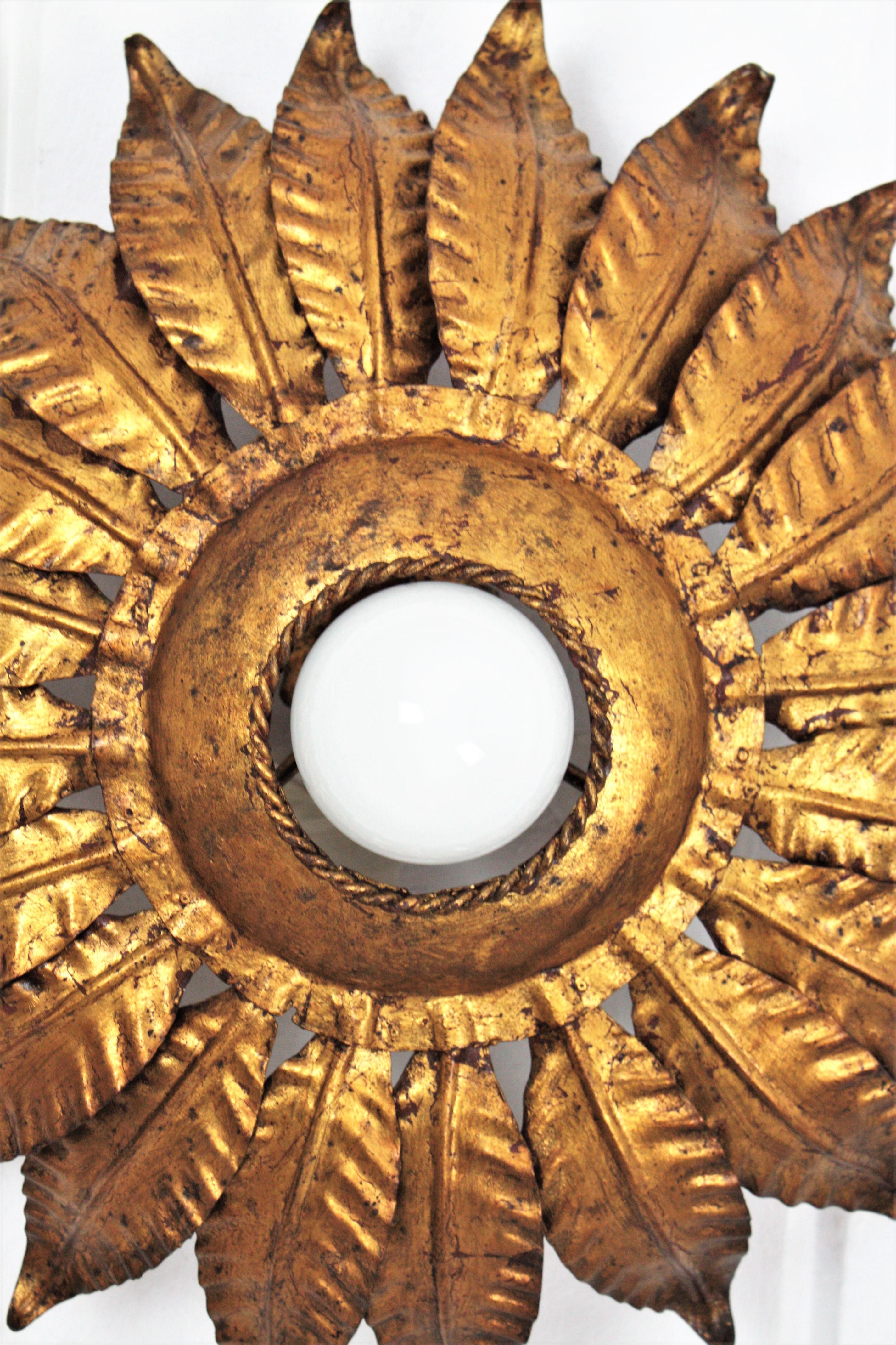 Hammered Spanish Sunburst Flower Light Fixture in Gilt Iron, 1950s For Sale