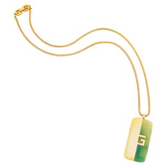 Gilt & Jade Lucite Logo Pendant Necklace By Givenchy, 1970s
