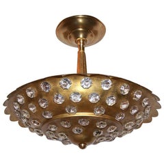 Lámpara dorada con inserciones de cristal. Se venden individualmente.