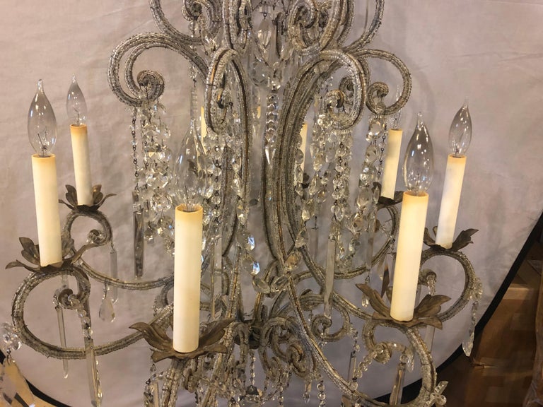 Gilt Metal 8Light Beaded Frame Having Hanging Crystal Prisms at 1stDibs