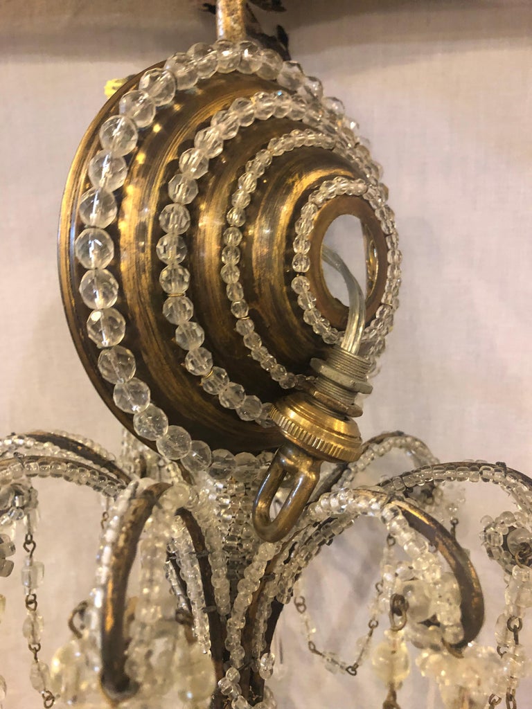 Gilt Metal 8Light Beaded Frame Having Hanging Crystal Prisms at 1stDibs