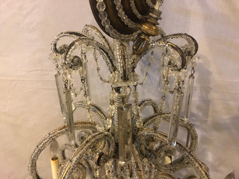 Gilt Metal 8Light Beaded Frame Having Hanging Crystal Prisms at 1stDibs