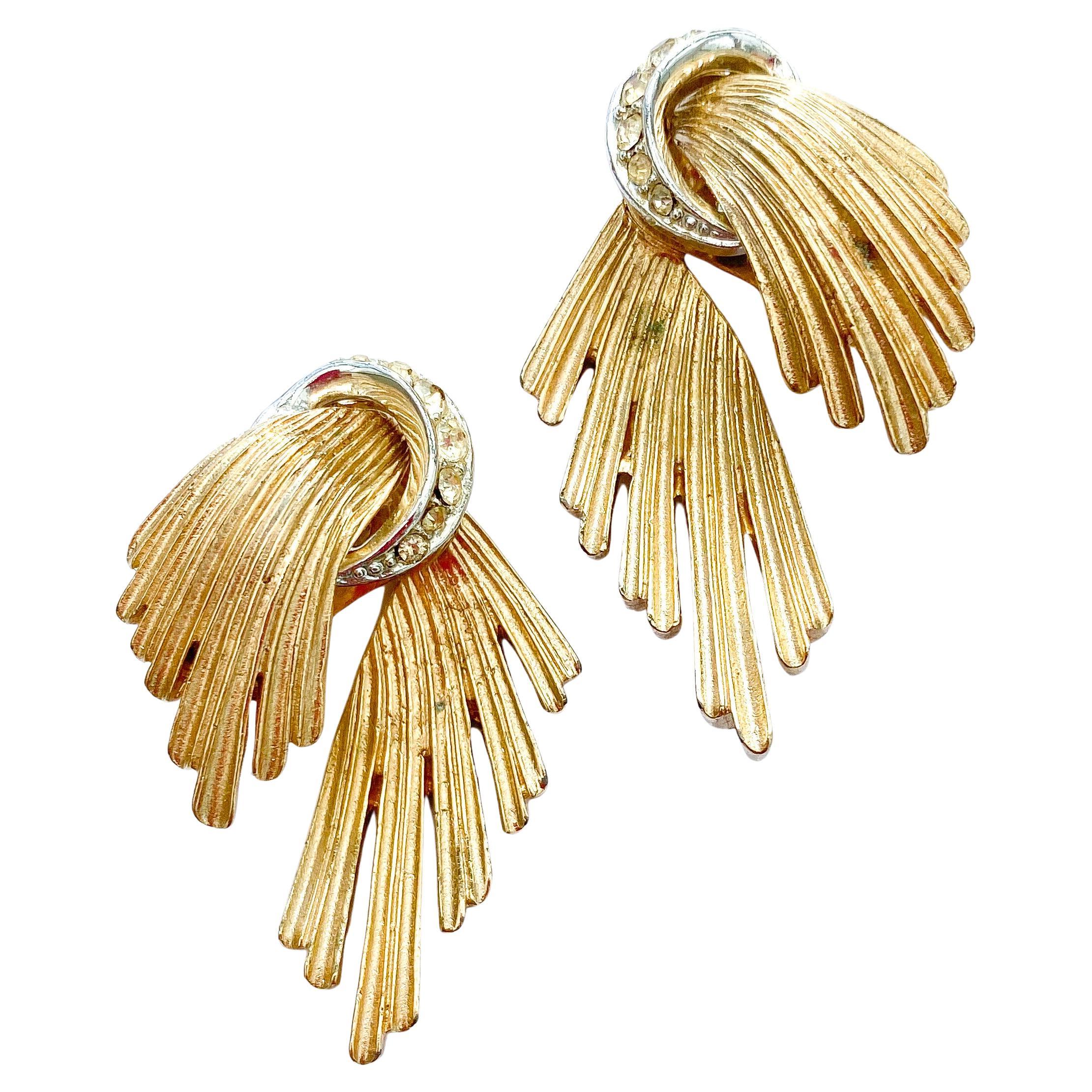 Gilt metal and clear paste split sided drop earrings, Marcel Boucher, 1960s, USA For Sale