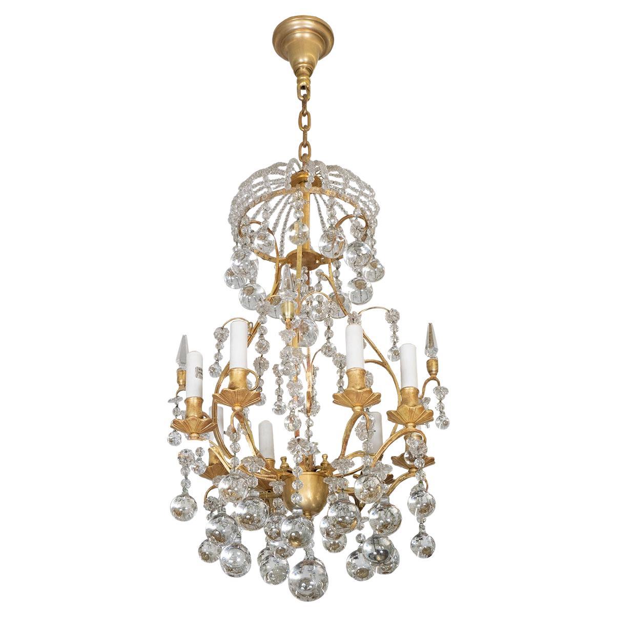 Gilt metal and crystal drop element chandelier For Sale