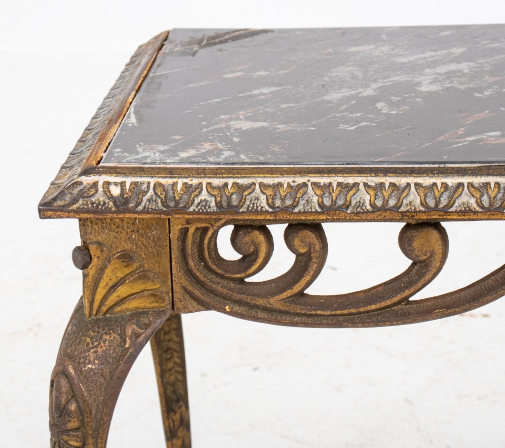 Gilt metal and glass occasional table with leaftip molded frame and cabriole legs, with marbleized glass inset. Christie's tag to leg.

Dealer: S138XX