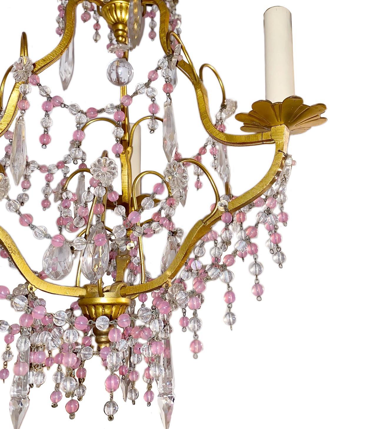 A circa 1920s three-arm Italian gilt metal and glass bead chandelier.

Measurements:
Height 24