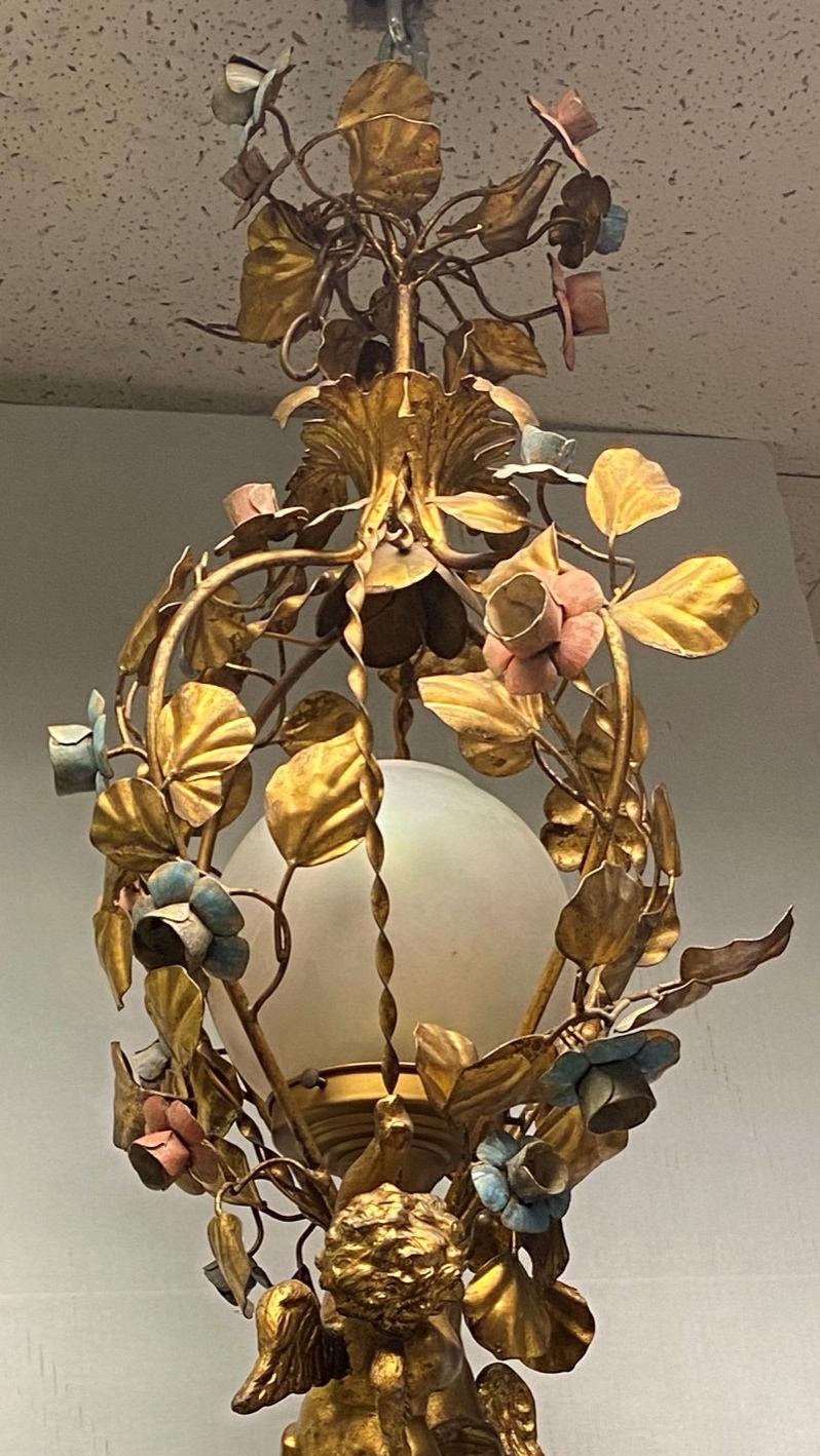 Gilt Metal and Tole Cherub Motif Chandelier In Good Condition For Sale In New York, NY