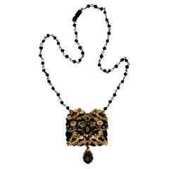 Gilt Metal Black Enameled Cherub Necklace with Black Glass Beaded Chain
