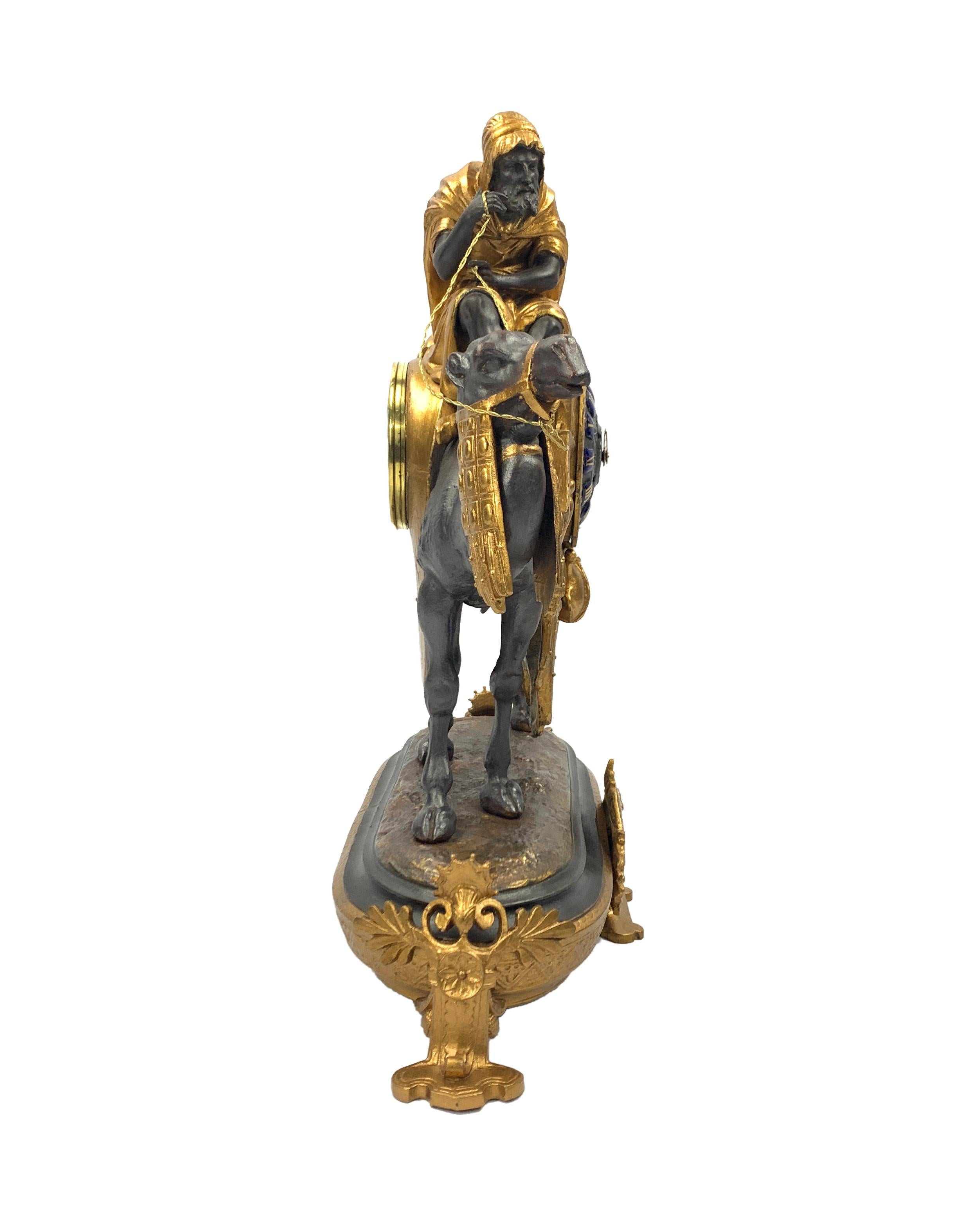 19th century French camel figural mantle clock, Cold painted Spelter figurine of a camel and Arab rider/keeper (Meharis).
 