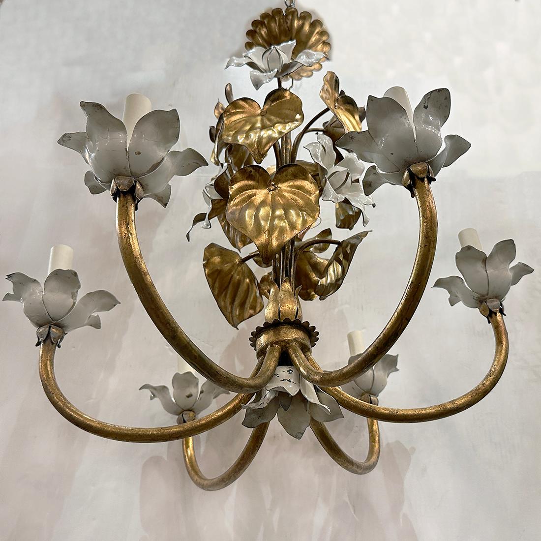 An Italian 1920's gilt metal chandelier with white magnolia flowers. 6 lights.

Measurements:
Drop: 26