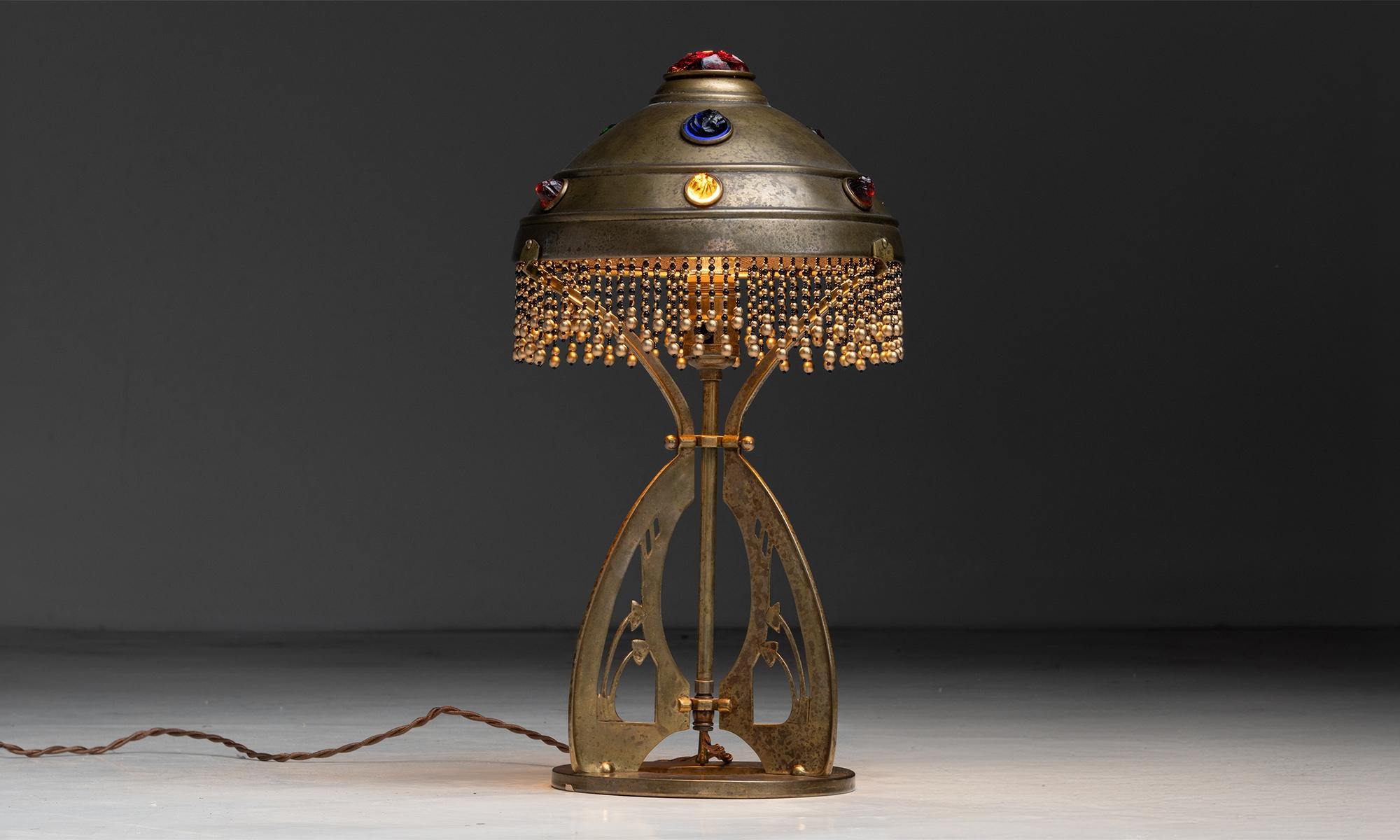 Austria circa 1915
Gilt metal table lamp with glass stones embedded into shade.
10