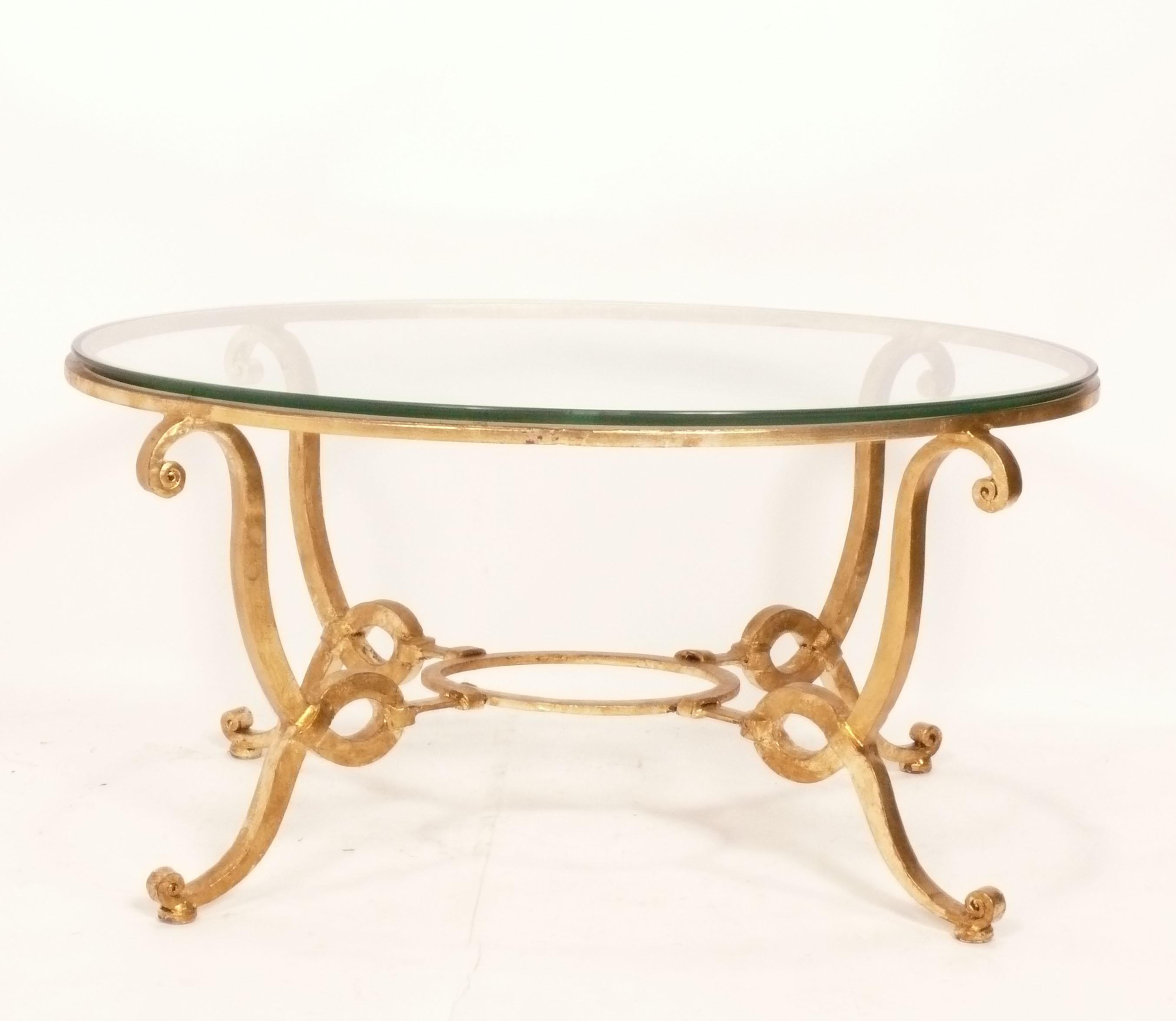 Glamorous gilt metal coffee table in the manner of Rene Drouet, French, circa 1980s.