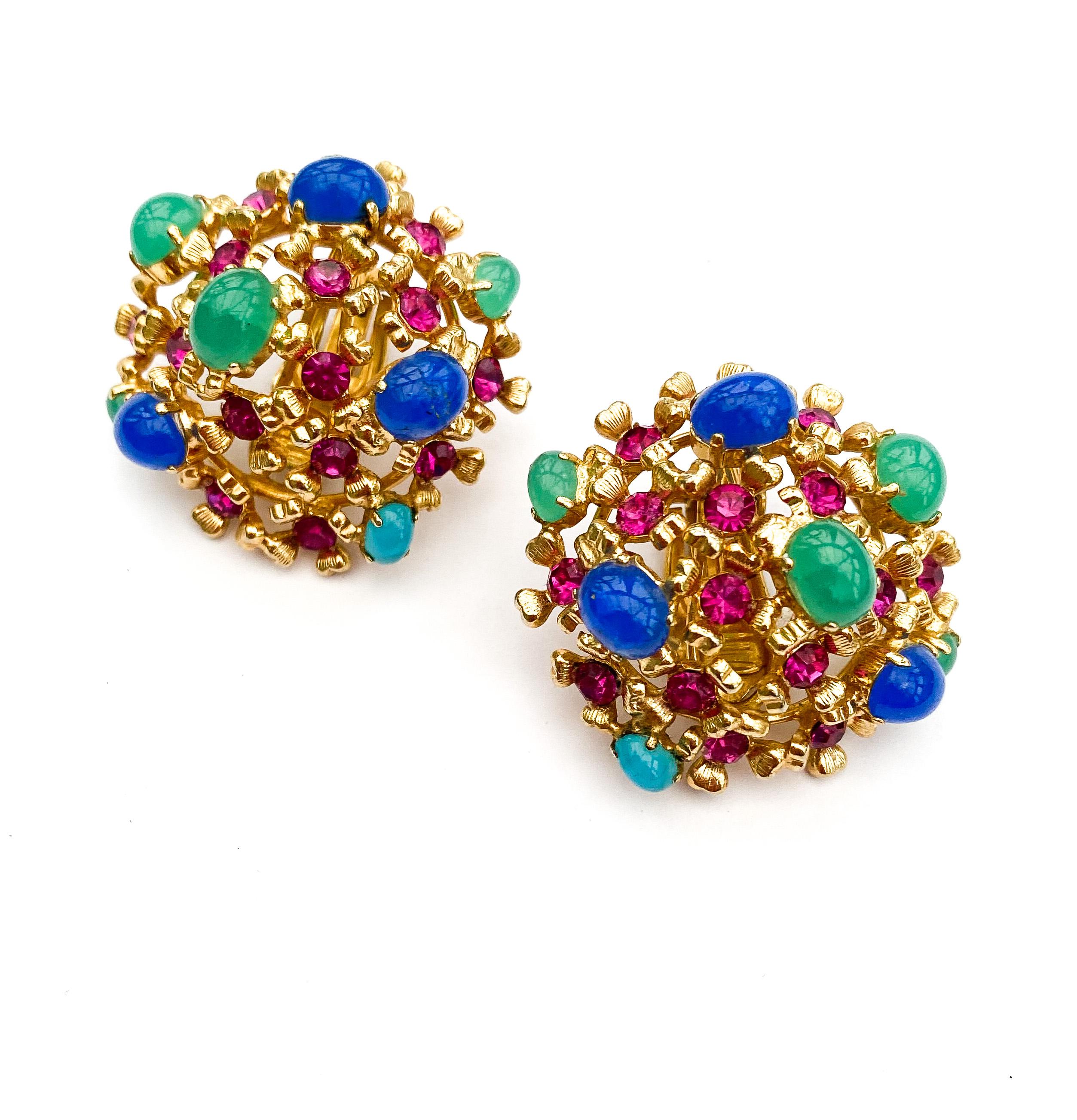 Exquisite and very glamourous 'cluster' domed earrings made by Henkel and Grosse for Christian Dior. Tiny gilt metal florettes or crosses form a domed earring, each studded with a ruby paste at the centre, supporting paste jade and blue chrysoprase