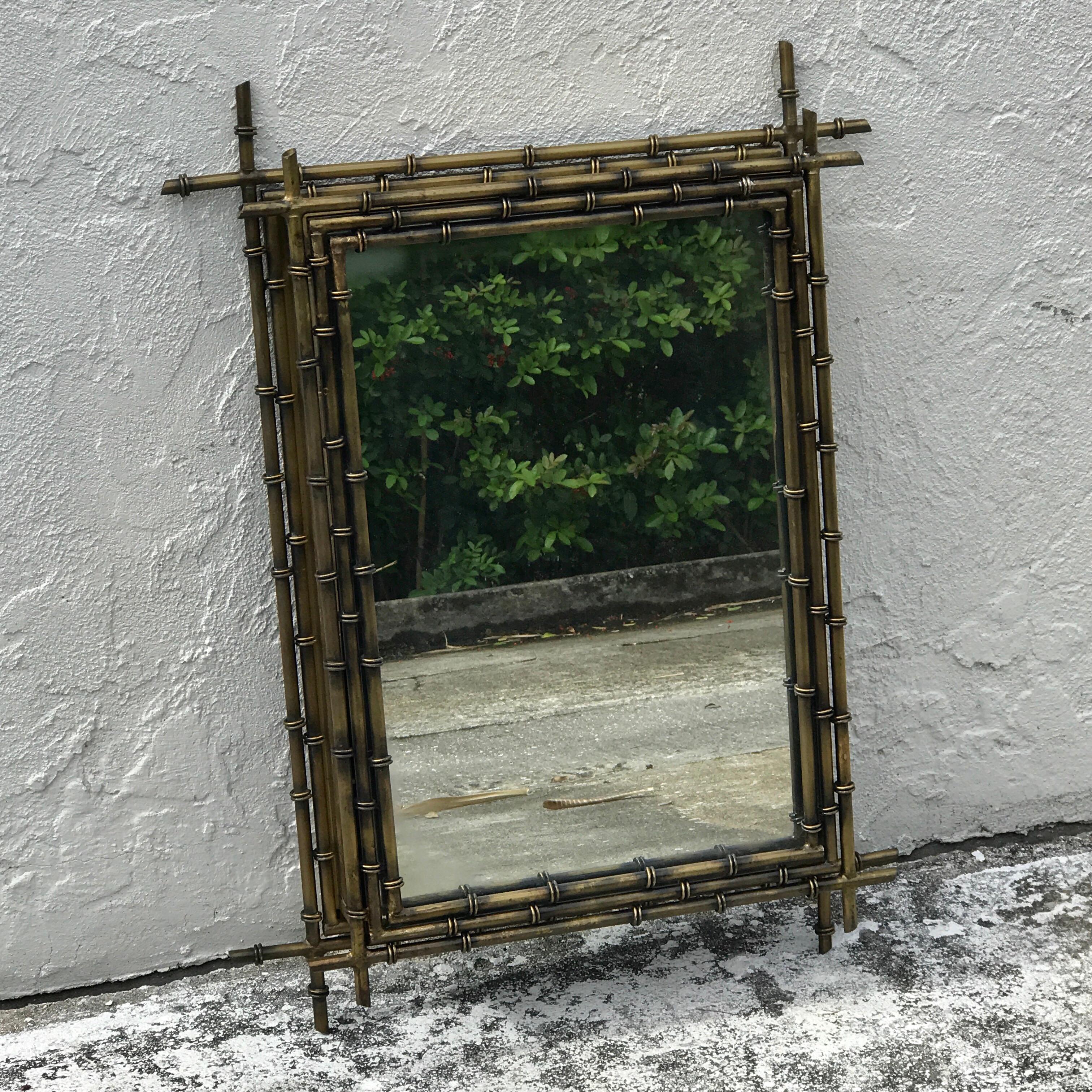 Gilt metal faux bamboo mirror, with 15