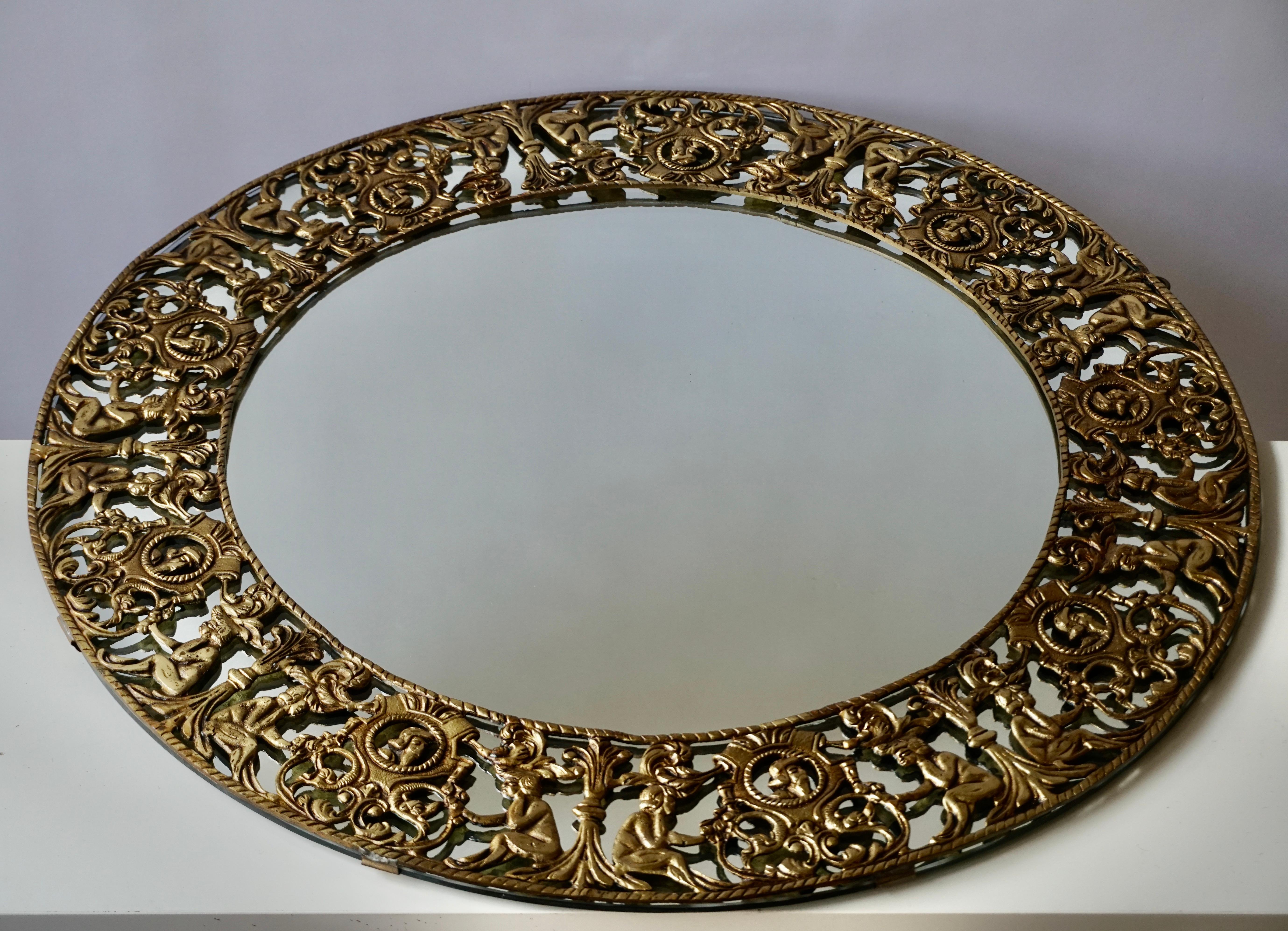 Hollywood Regency Gilt Metal Figural Sunburst Wall Mirror For Sale